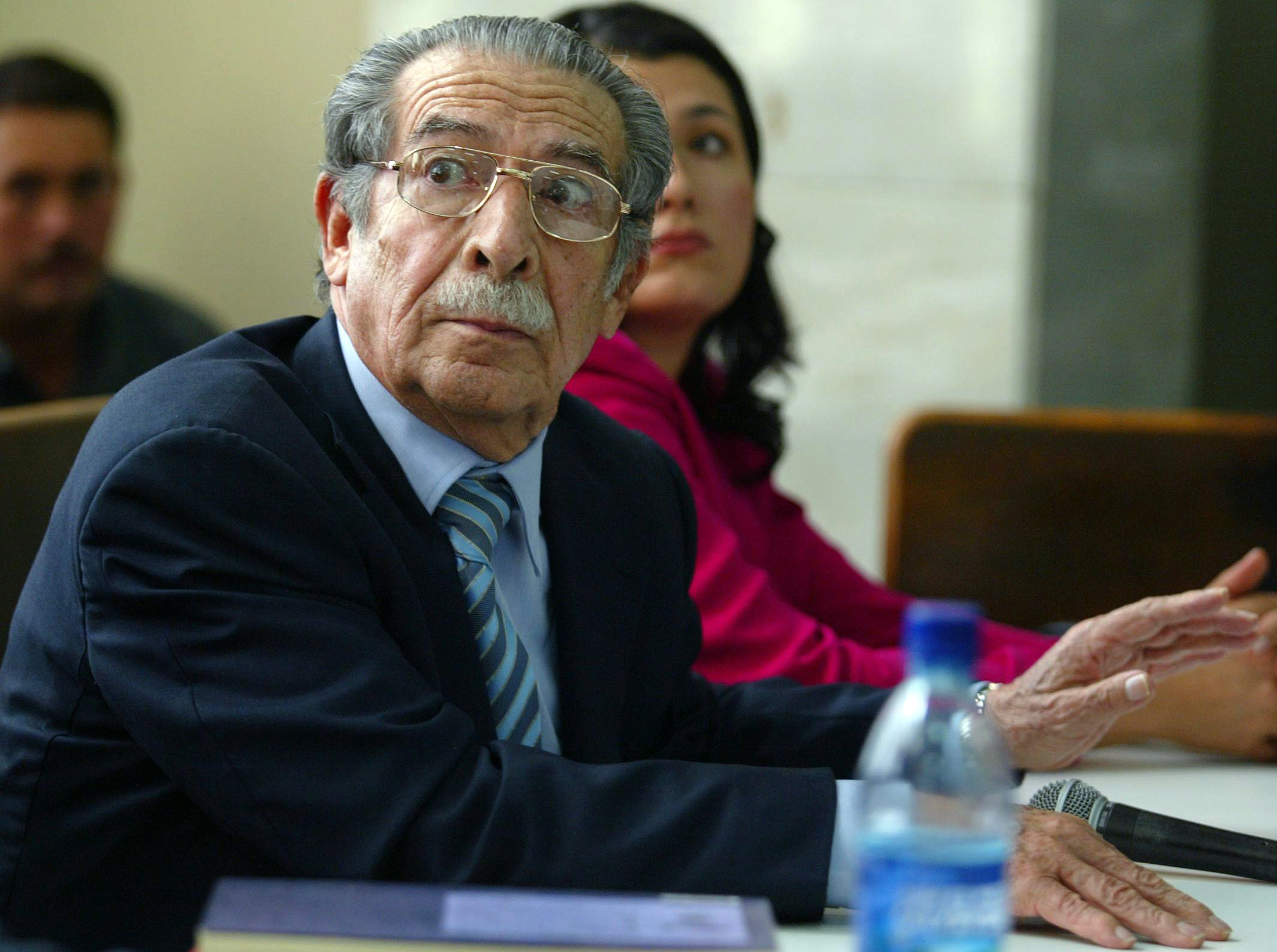 Former Guatemalan president Efrain Rios Montt listens during a court hearing in Guatemala City on Jan. 27, 2006. (Carlos Duarte/Reuters)