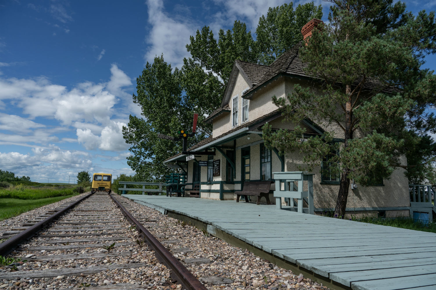 The main rail line was removed years ago but a short section of track remains outside the historic station in Rowley, Alta. (Vincent Bonnay/Radio-Canada)