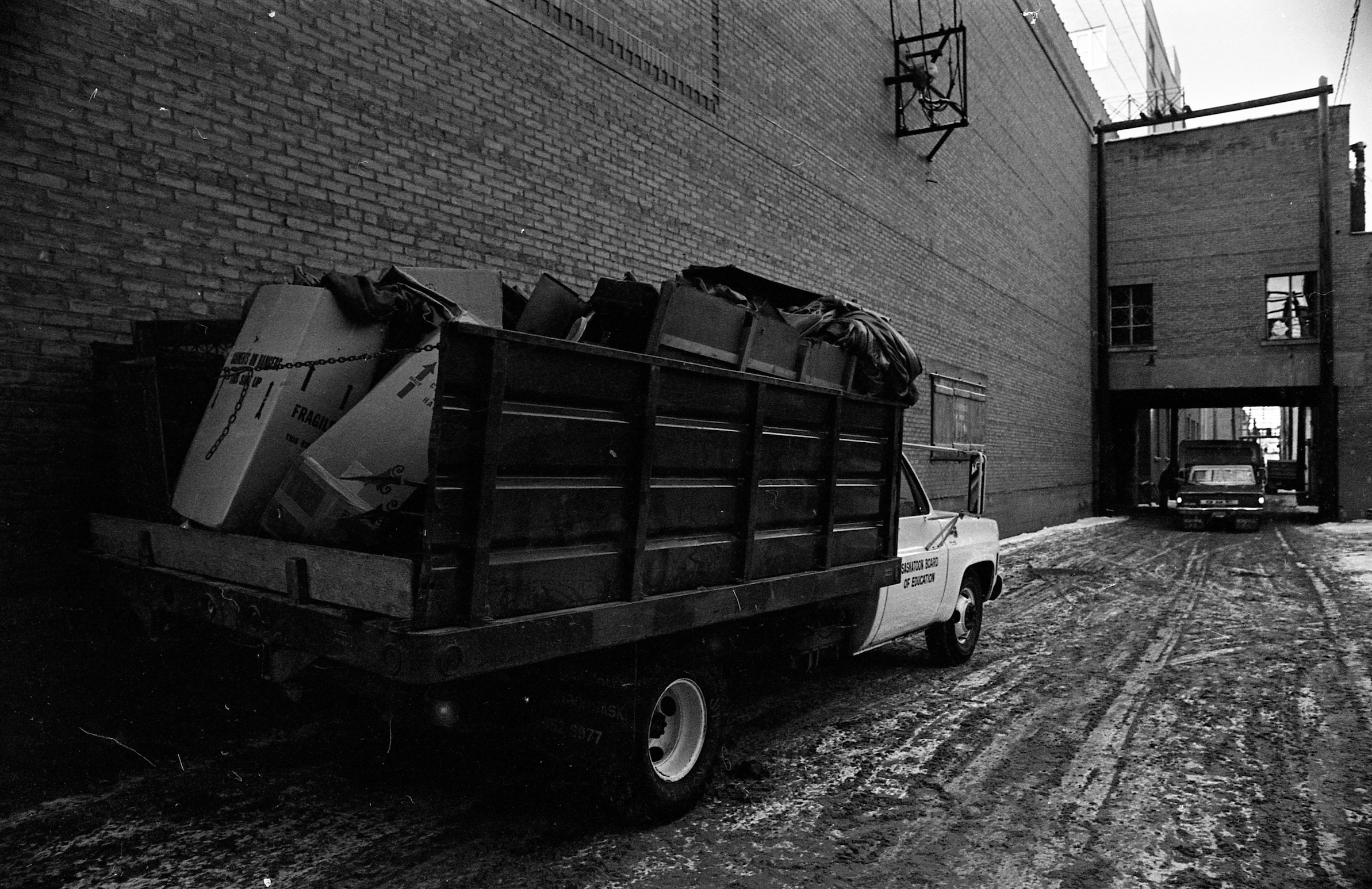 A Saskatoon Board of Education truck makes off with material from the Capitol during the demolition. (Saskatchewan Archives; item S-SP-A12333-13)