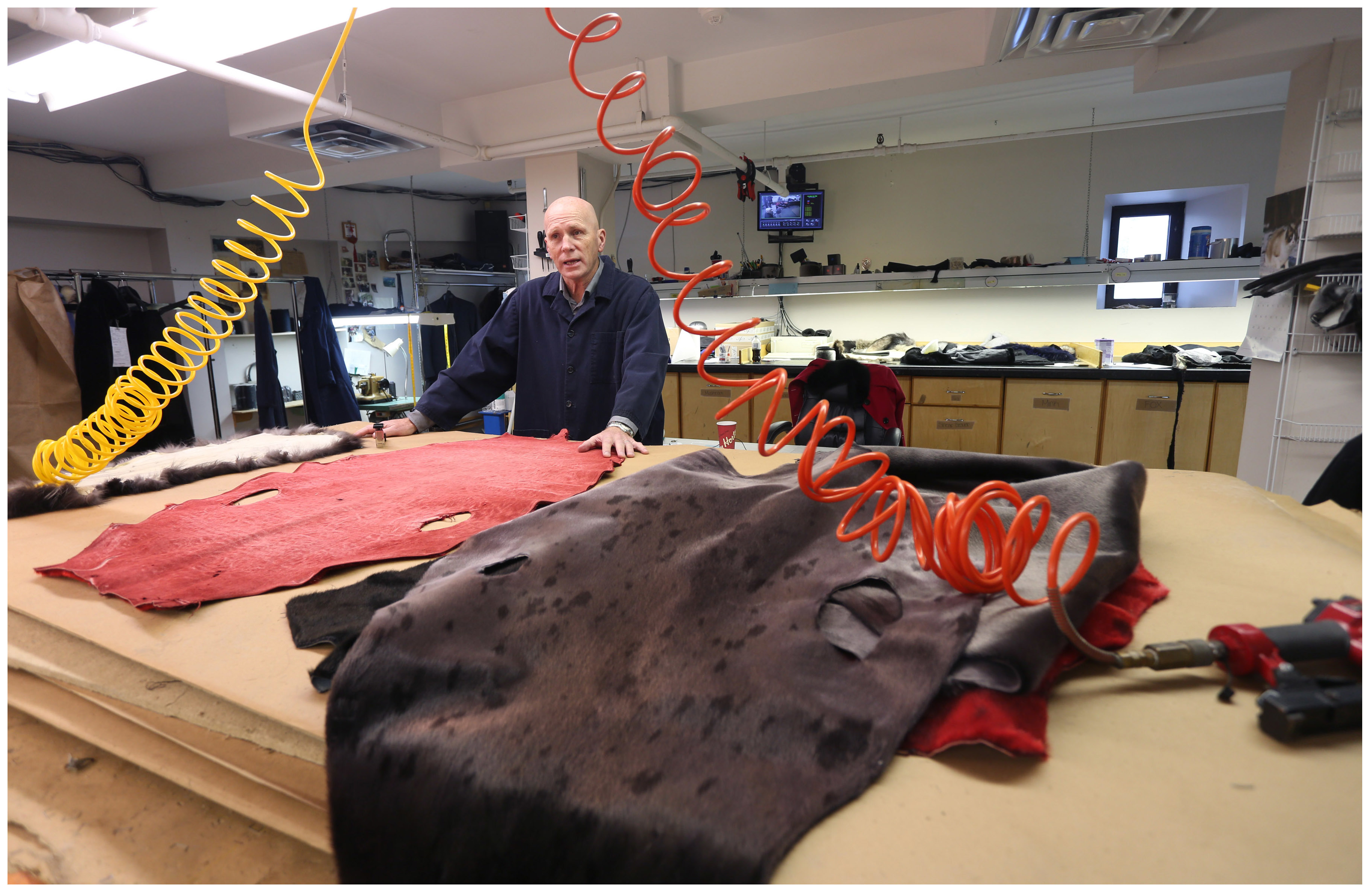 Bernie Halloran displays seal pelts that will be made into coats in his store, Always in Vogue, in St. John's, in this photograph from January 2017. (Paul Daly)