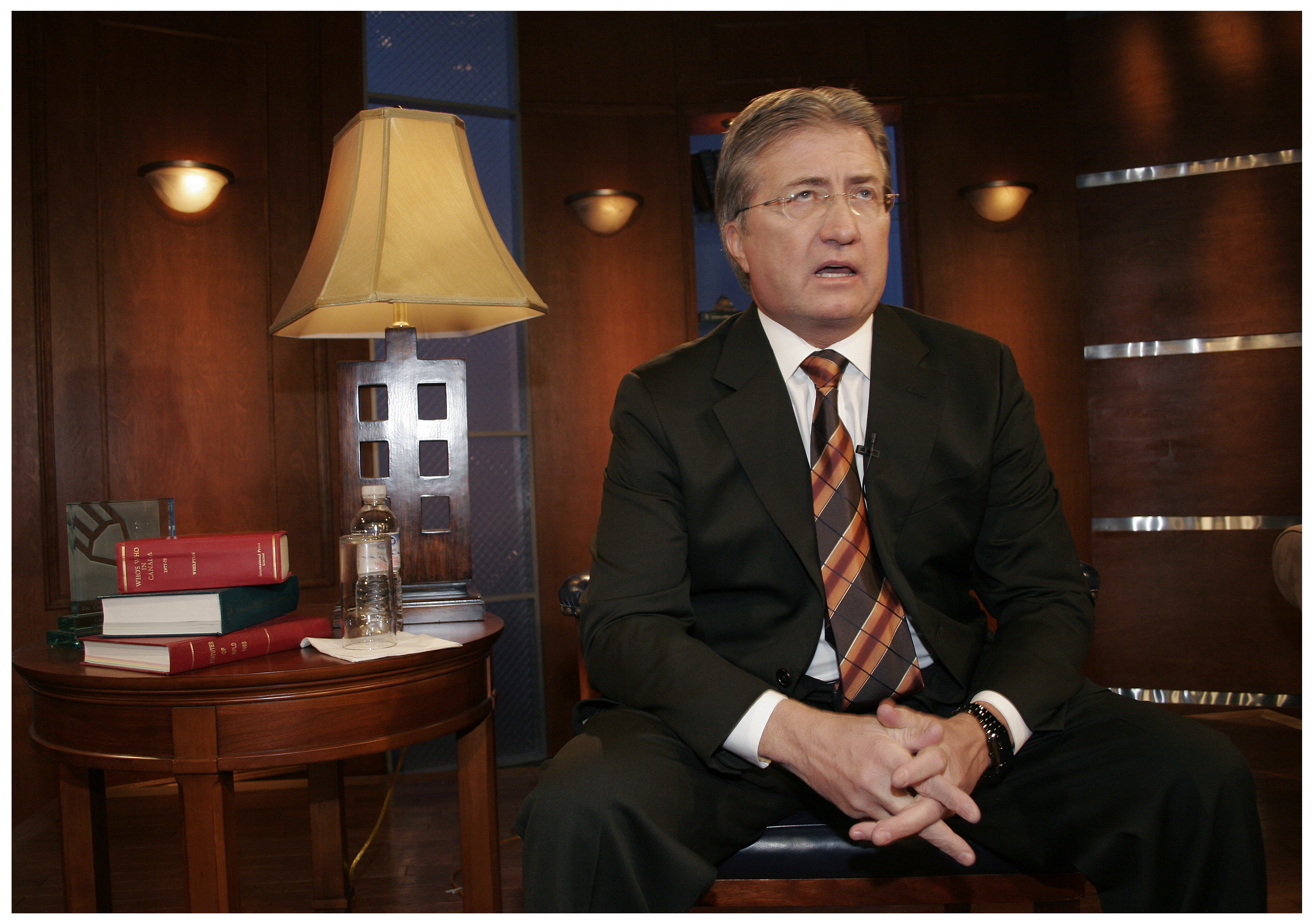 Danny Williams gets ready for his remote interview on Larry King Live on March 3, 2006 at the CBC studio in St. John’s. Williams faced off against pop star Paul McCartney and his wife of the time, Heather Mills, who were visiting Quebec. (Paul Daly)