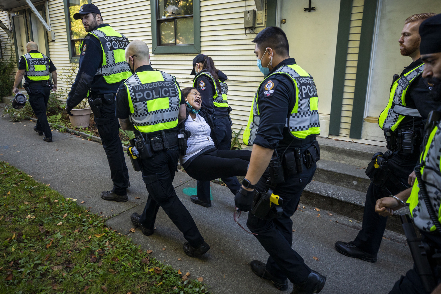 Activist Chrissy Brett is arrested during a housing-for-all protest near the tent emcampment she oversees in Strathcona Park in Vancouver on Sept. 28, 2020.  (Ben Nelms/CBC Vancouver)