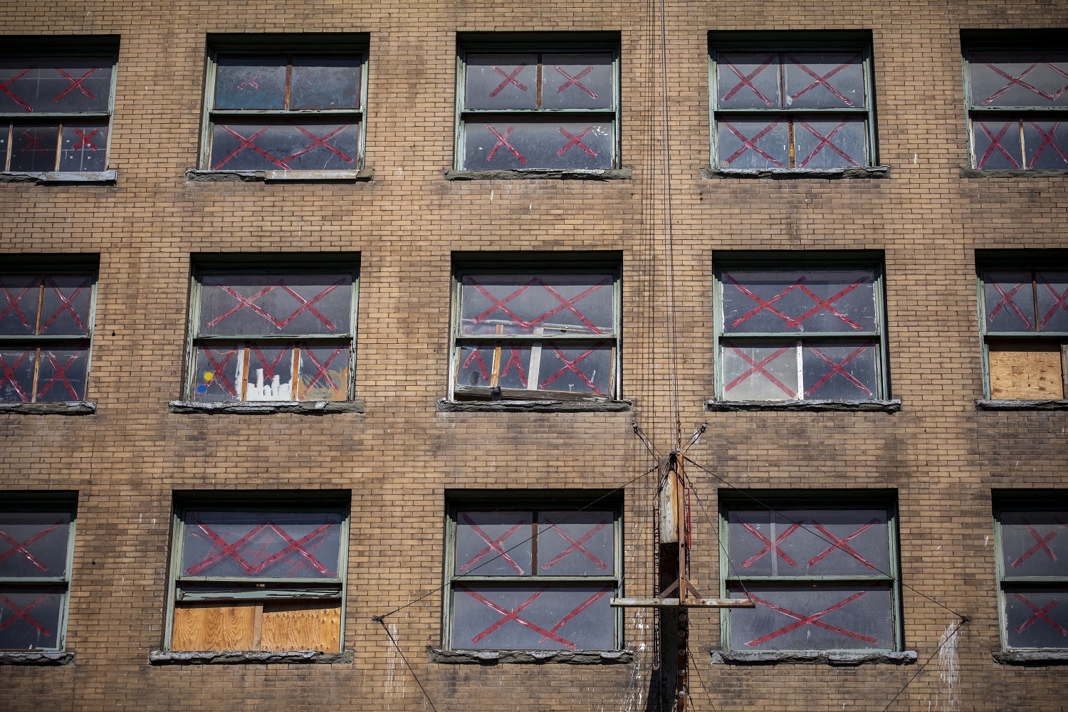 The windows of the Balmoral Hotel on Hastings Street in the Downtown Eastside in Vancouver, British Columbia. (Ben Nelms/CBC)