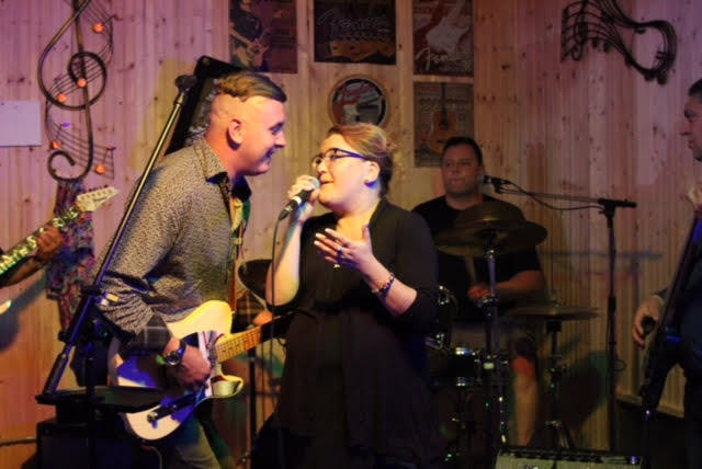 Carolina East front woman belts out a tune with guitar player Chris Ryan. (Dennis Murray)