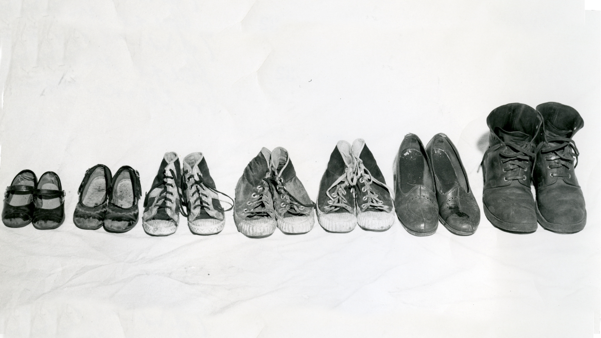 RCMP carefully laid out the shoes of all seven victims as part of evidence in the case. (Legal Archives Society of Alberta)