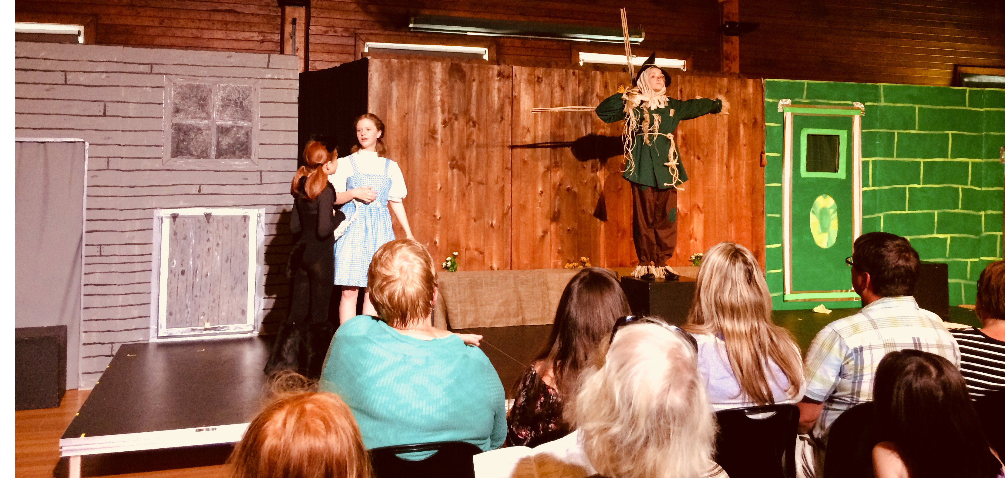 Dorothy, played by Emily Smith, meets the Scarecrow, played by Krysten Cameron, for the first time. (Sarah Keaveny-Vos/CBC)