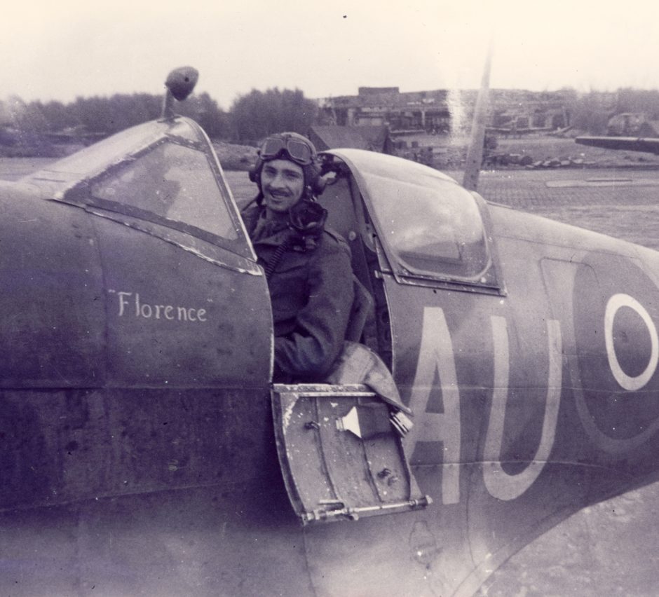 Royal Canadian Air Force pilot Ed Mann is shown in the cockpit of his Spitfire, which was named Florence after his wife.