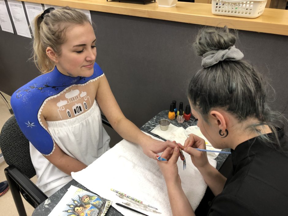 Miranda Klippenstein paints intricate nails as she practices for competition.