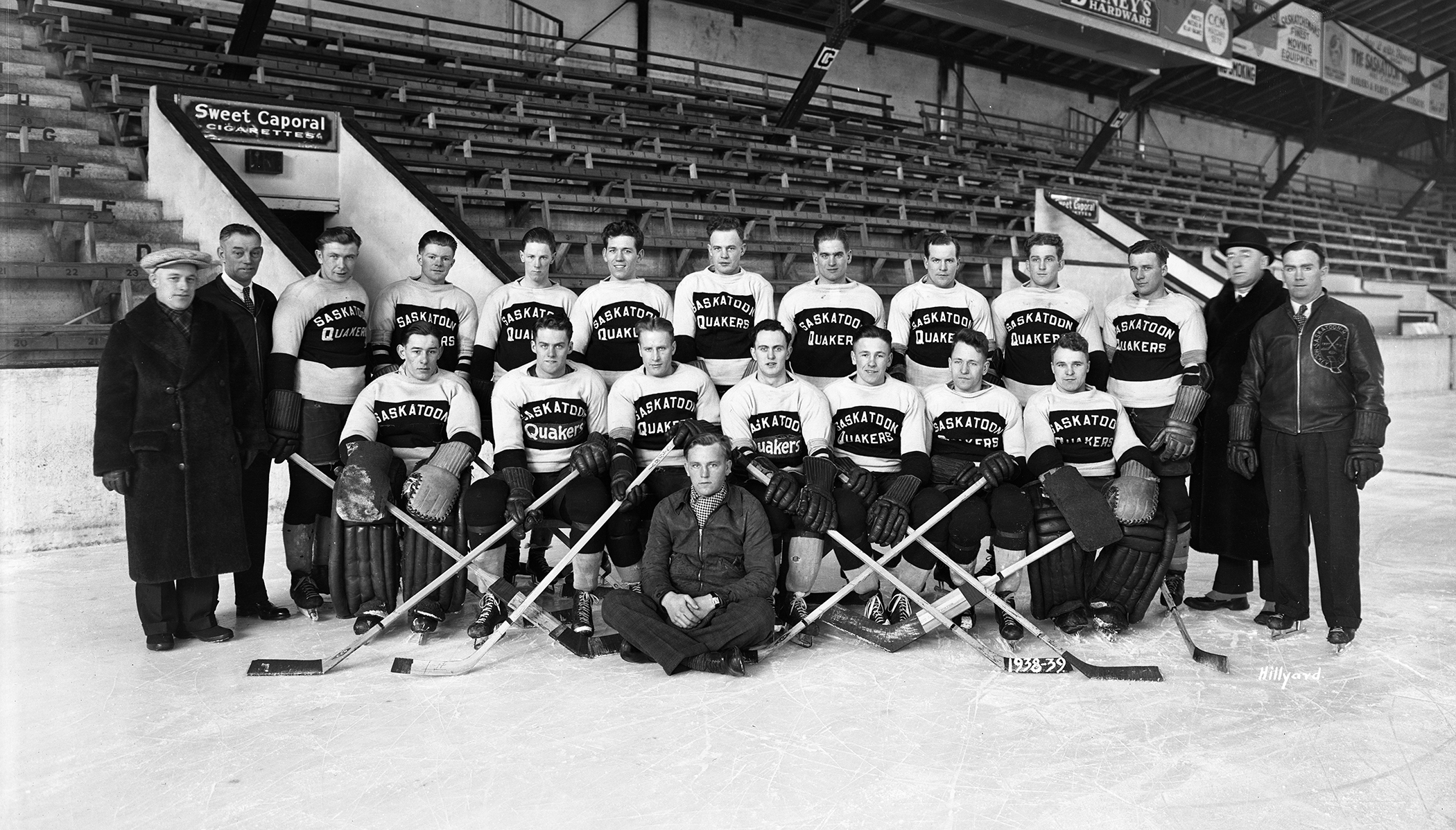 The (mostly) unsmiling members of the 1938-39 Saskatoon Quakers minor-pro hockey team inside Saskatoon Arena. (Saskatoon Public Library Local History Room - Photo A-661)