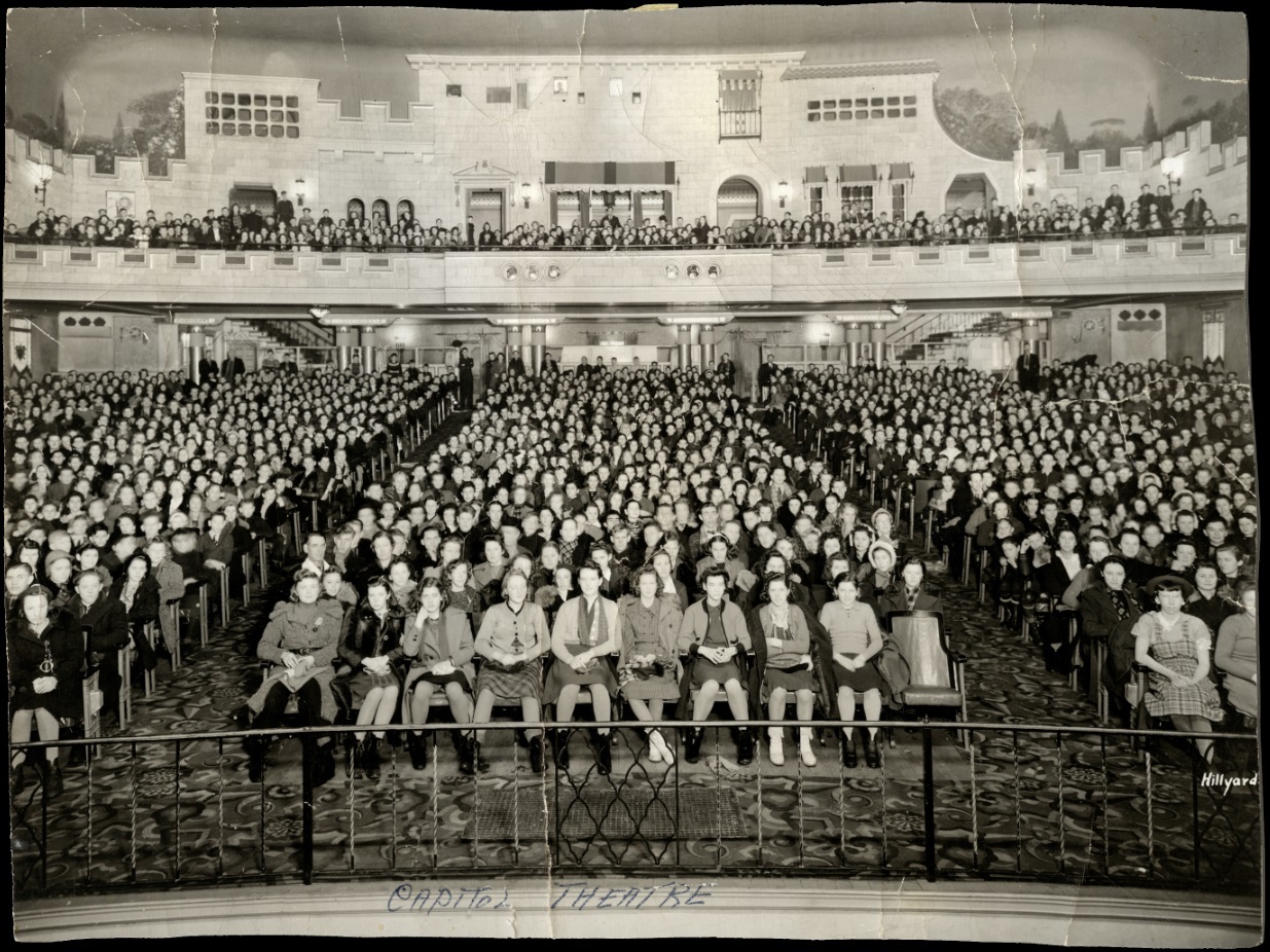 A packed Capitol auditorium around 1940. The projection booth is dead centre, above the loges. (Saskatoon Public Library Local History Room; item PH-88-591)