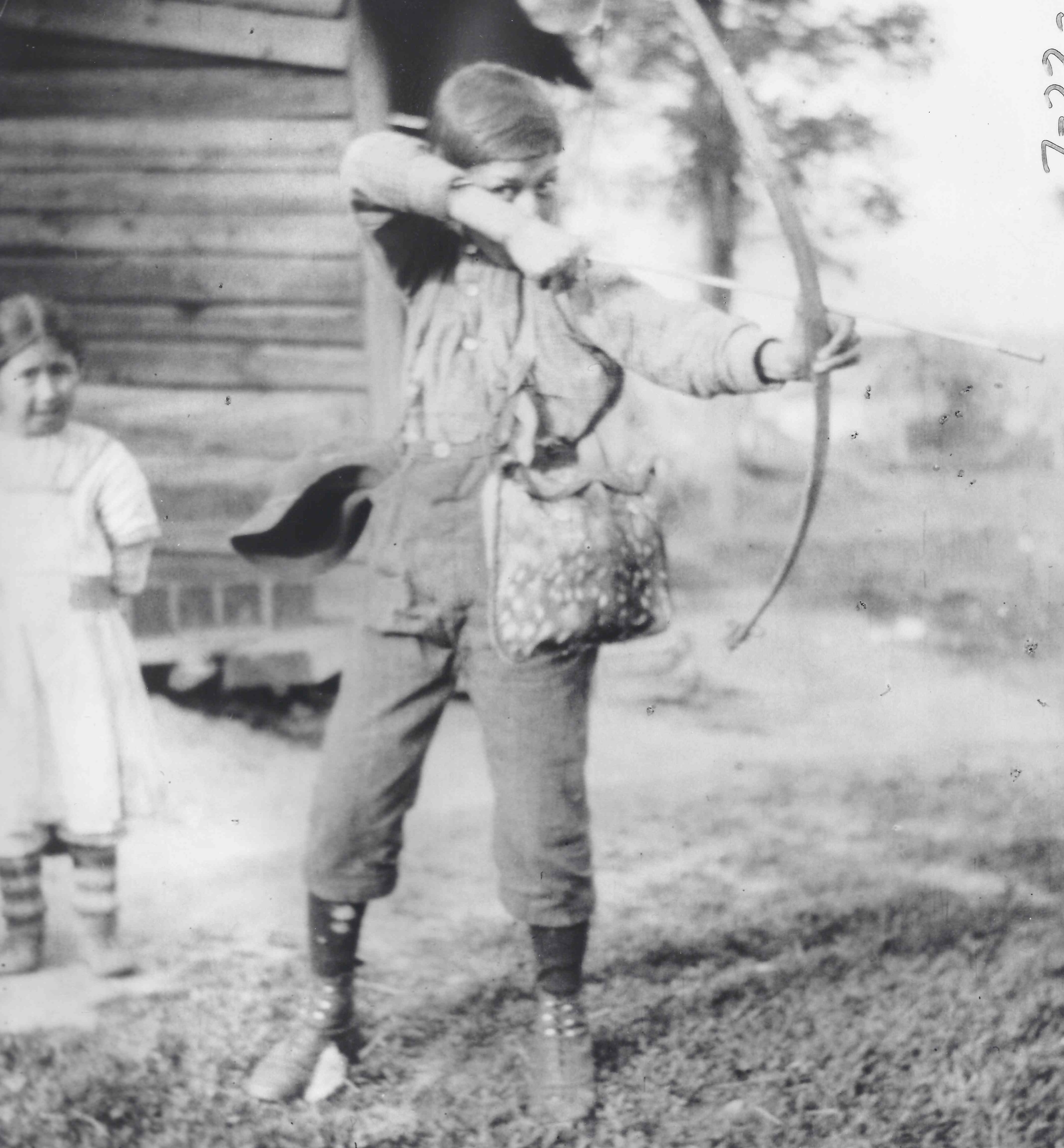 Boy with bow and arrow — Timiskaming circa 1913. (Frank Speck/American Philosophical Society)