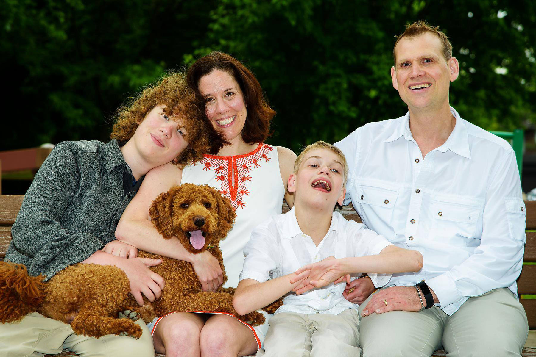 The family with their dog, Quincy. (Brian Tao)