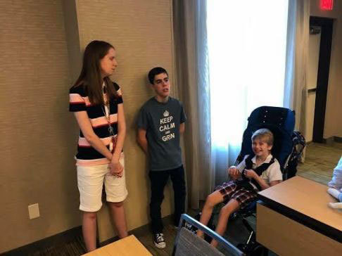 Bryson hangs out with two of his 'GRIN twins' -- Olivia, left, and Owen -- during a GRIN families meet-up in Pittsburgh in 2017. (Submitted by Keith McArthur)