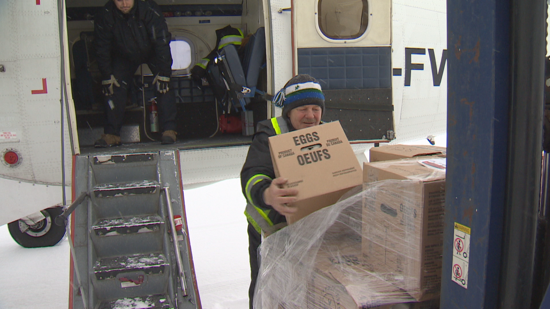 Cargo is loaded onto our flight bound for Nain. (Bruce Tilley/CBC)