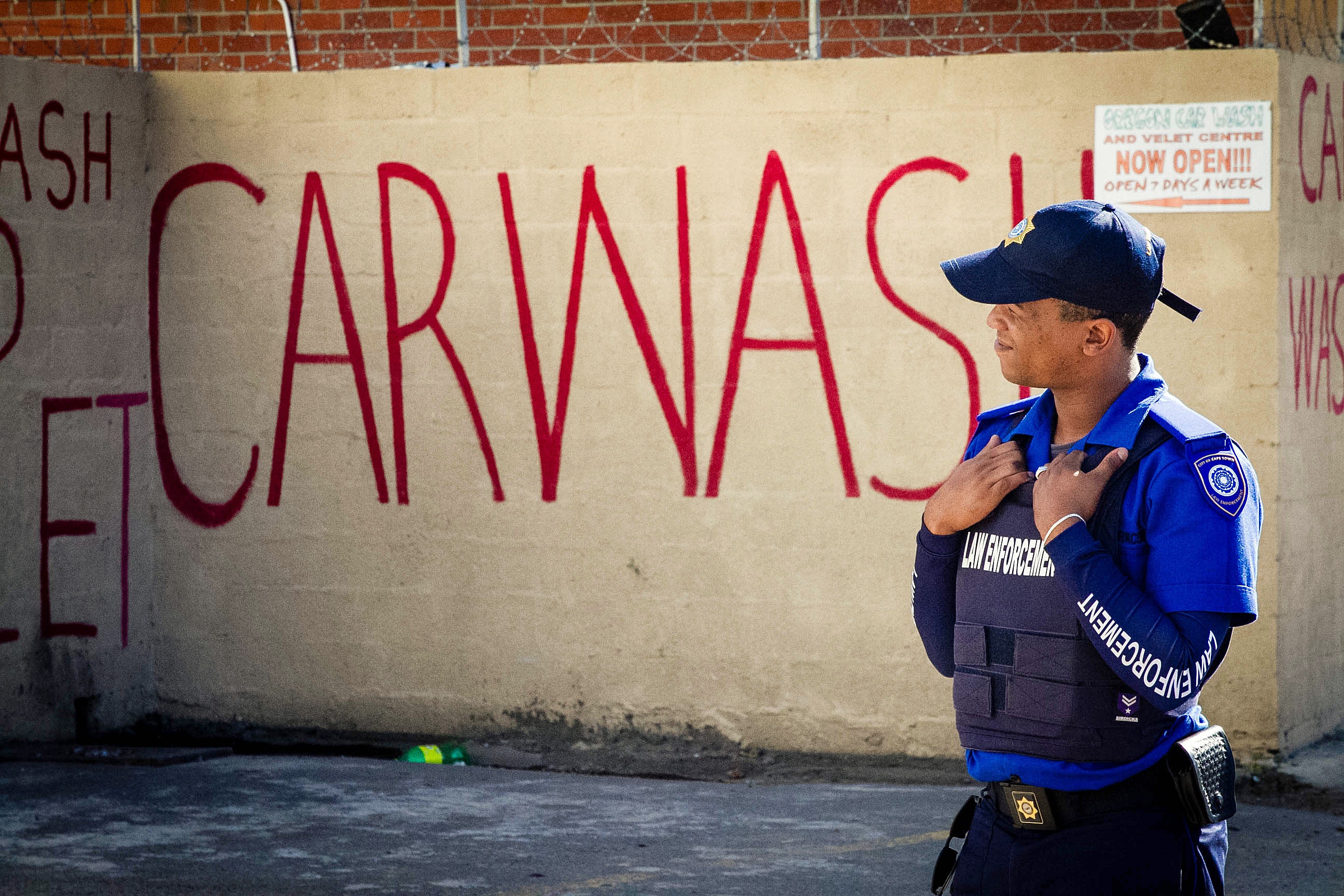 Police have been keeping a close eye on car washes, particularly makeshift operations in the townships and settlements. (Lily Martin/CBC)