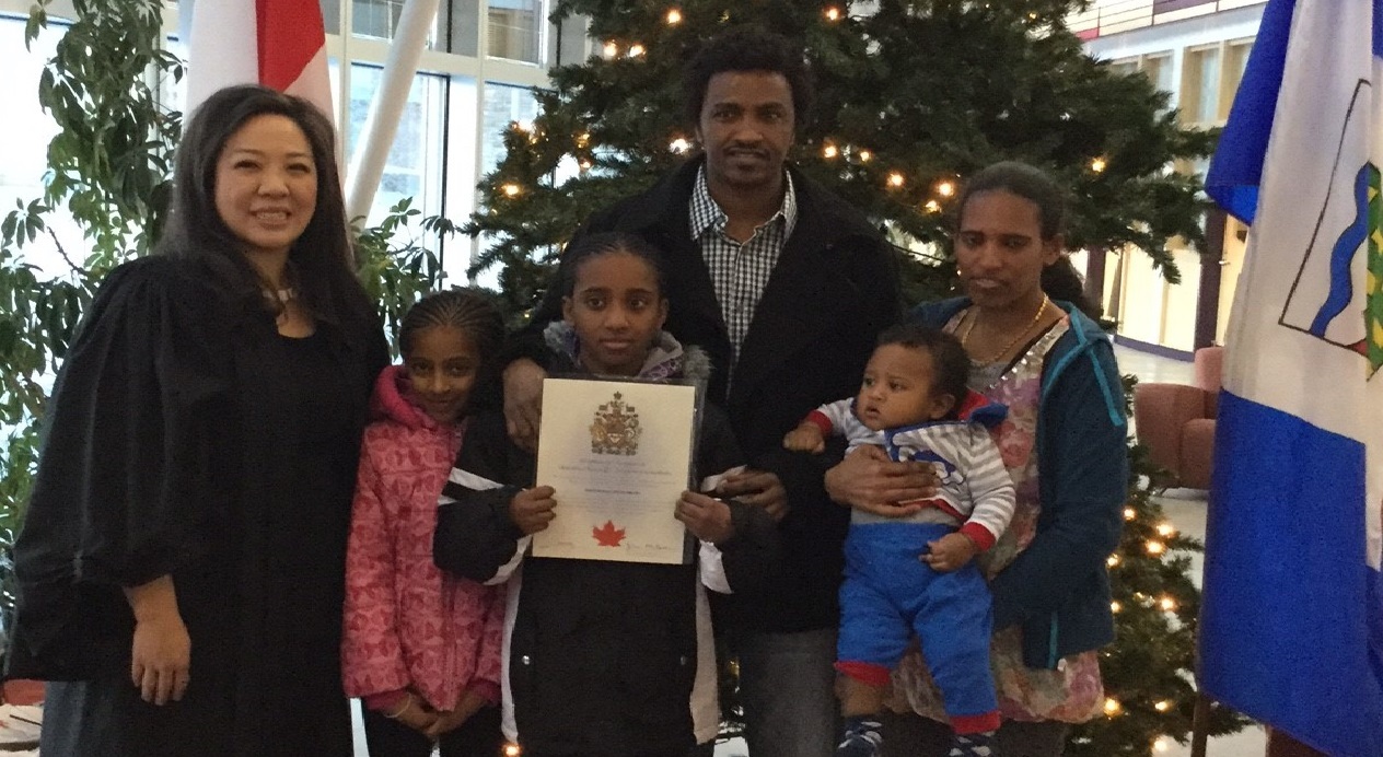 The family celebrates Tesfamichael Abraha's Canadian citizenship in 2016. (Submitted by Art Durkee)