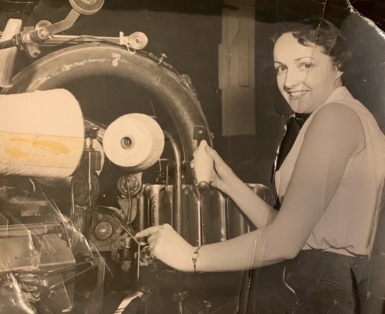 Daisy Nichols, operating Winding Machine #7 at the Dominion Woollens and Worsted Mill. Submitted by Gail Hammond