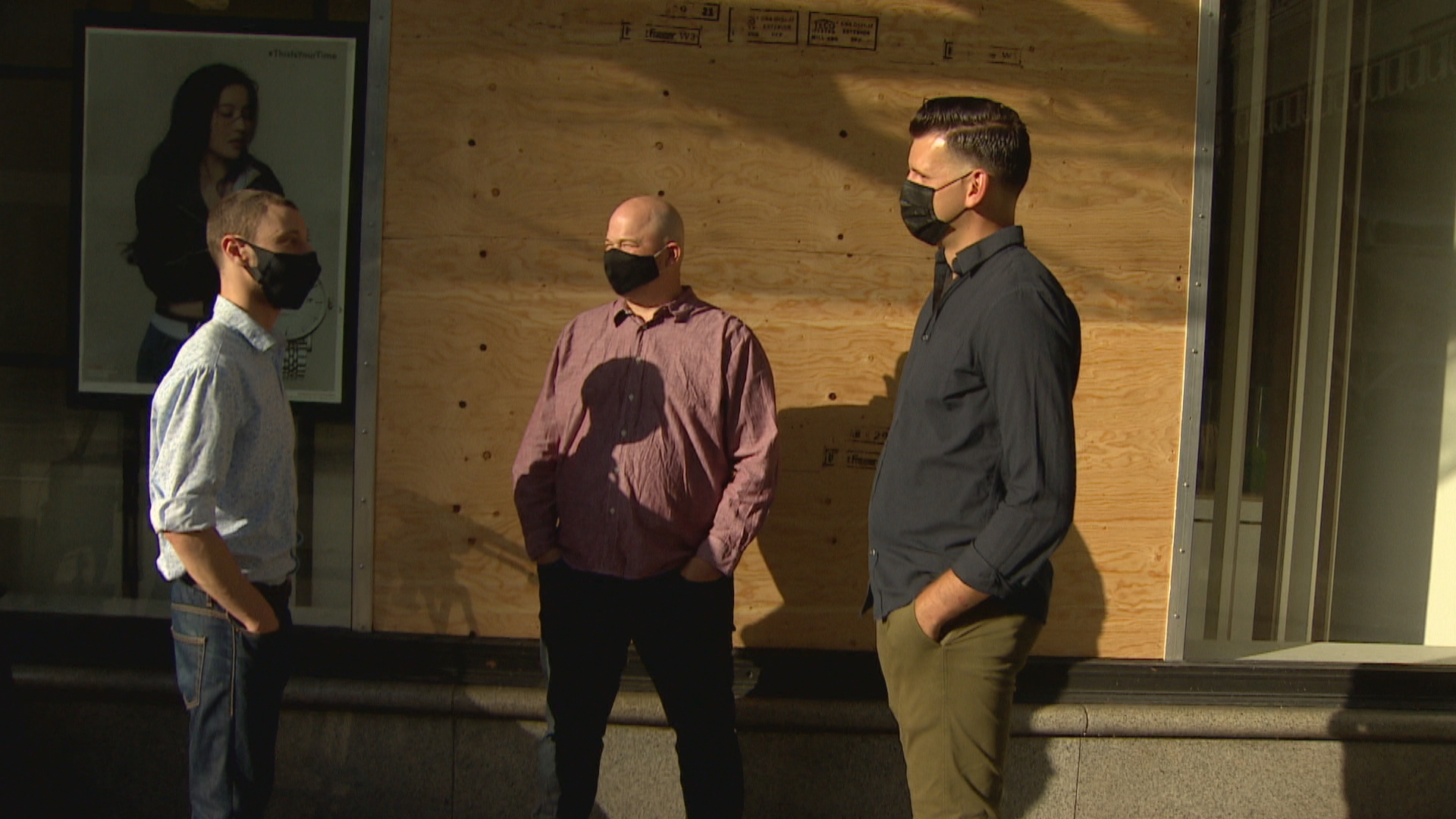 Left to right: Dean Seskin, Rob Mackay and Chris McClelland meet our front of the Bay department store in downtown Vancouver. Ten years later, the three are friends and keep in touch. (Christian Amundson/CBC)