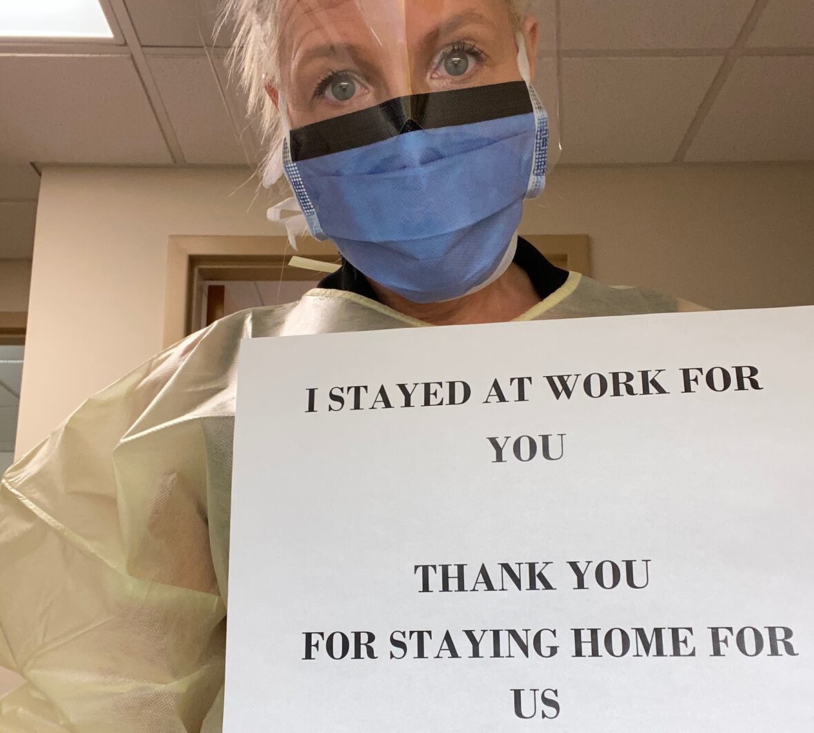 The spouse of an occupational health nurse says front-line workers are putting patients first, so the public should do its best to prevent them from getting sick. (Submitted by Chris Marshall)