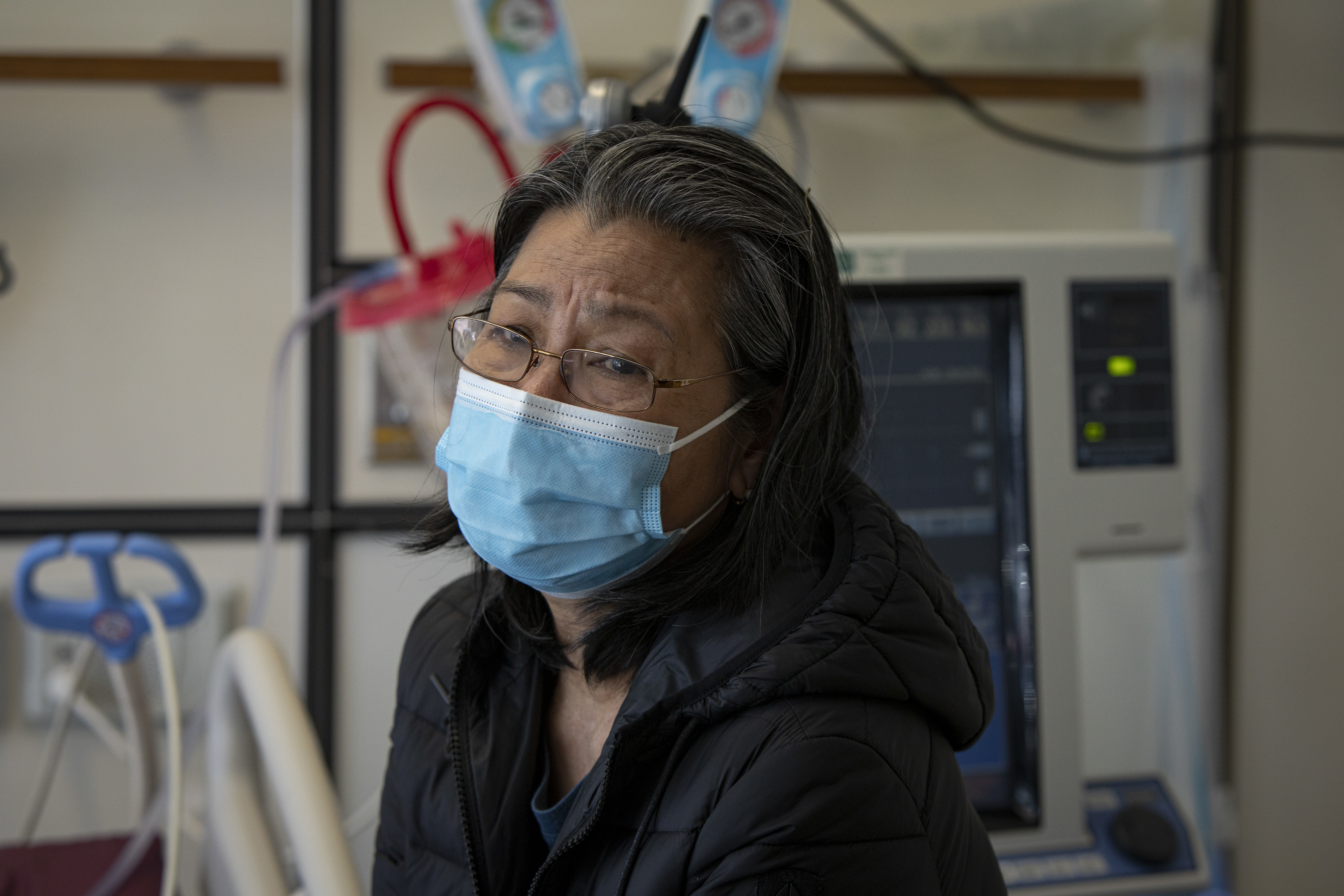 Esther Teodoro had COVID-19 in January. So did her husband, Eduardo, who she now visits regularly in the intensive care unit of the Scarborough Health Network's Centenary Hospital in Toronto's east end. (Evan Mitsui/CBC)