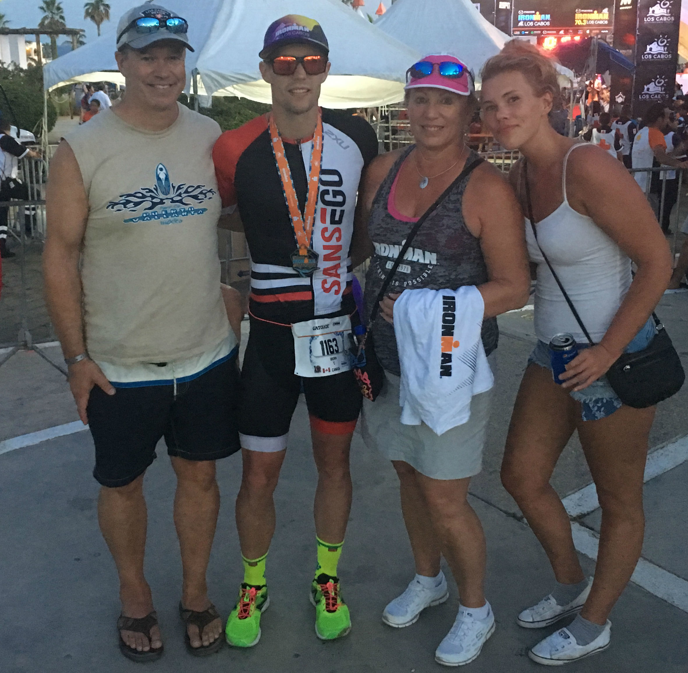 Brown's sister Cori (far right) poses for a picture with her parents after the 2017 Ironman event in Mexico. Work has begun to set up an endowment at Memorial University and College of the North Atlantic in her name. (Submitted)