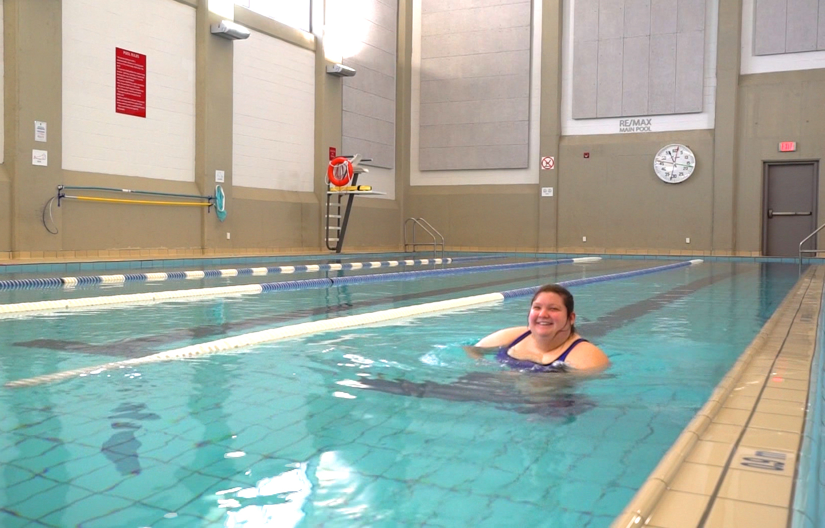 Hayley Redmond, who started swimming when she was three, says being in the water gives her freedom to move around on her own. (Sherry Vivian/CBC)