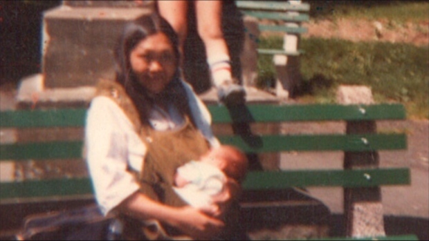 Henrietta Millek holds her baby son Byron at Victoria Park in St. John's. (Submitted)