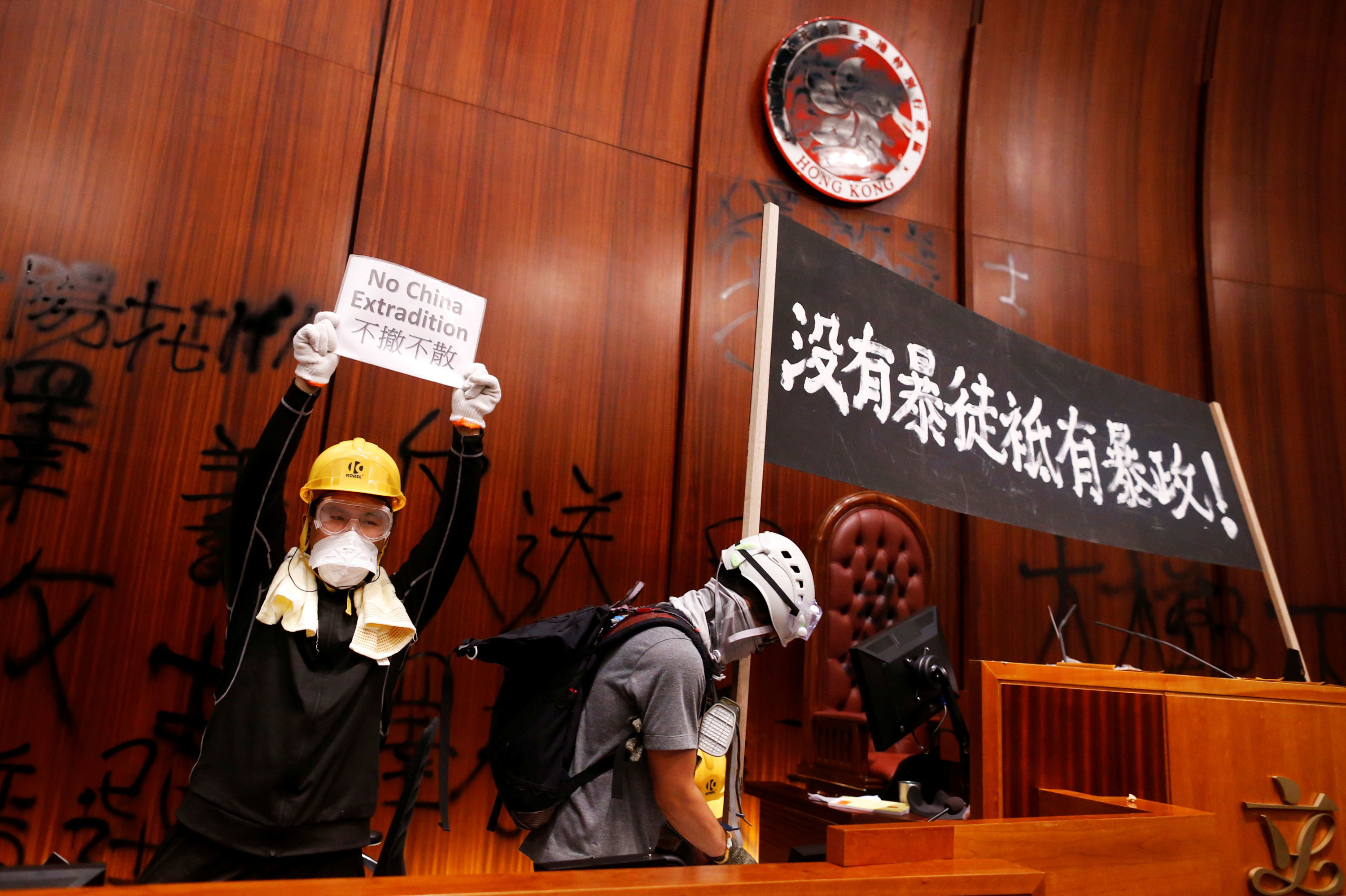 After the protesters breached the Hong Kong legislature on July 1, they defaced the inside of the building with slogans. (Stringer/Reuters)