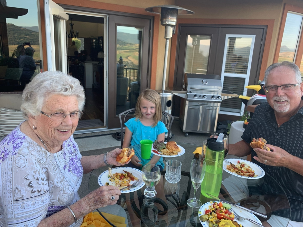 Dodie Anderson shares a meal and a smile with her son Phil and granddaughter on her 92nd birthday. (Submitted by Susan Harris)