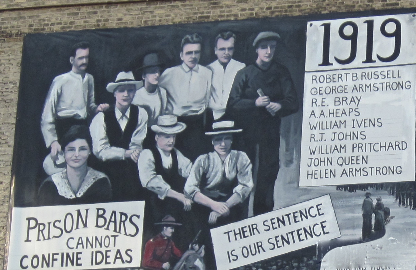 A mural on a building on Main Street and McDermot Avenue, along the stretch of Main that was the scene of Bloody Saturday, shows Helen Armstrong along with the eight jailed strike leaders. The mural, painted by Tom Andrich, is no longer there. (MaryLou Driedger/Destination Winnipeg)