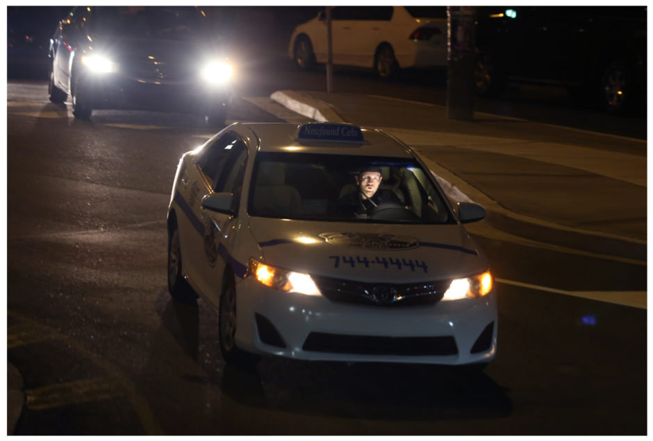 Arthur Green at work in his cab in St. John's. (Paul Daly/CBC)