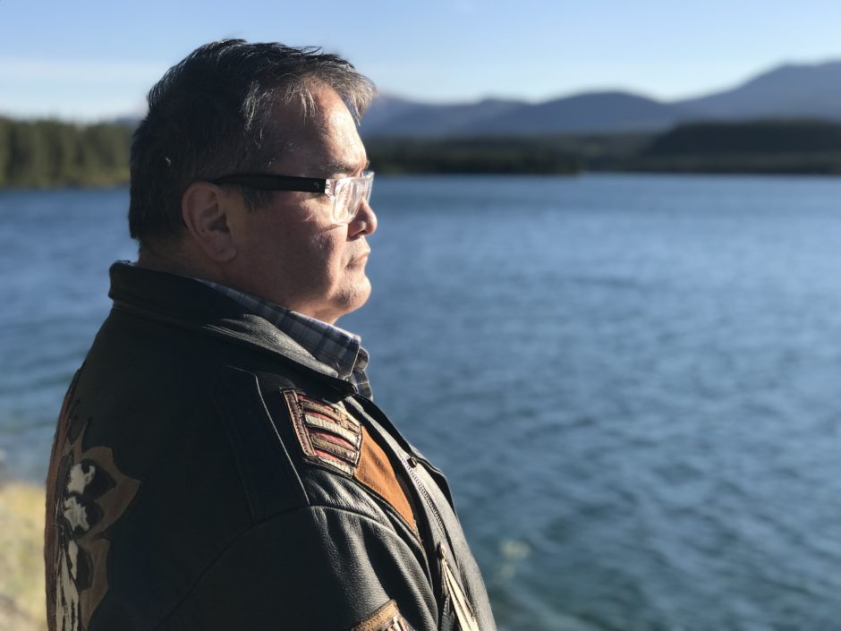 Gord Loverin looks out over a lake in Whitehorse.