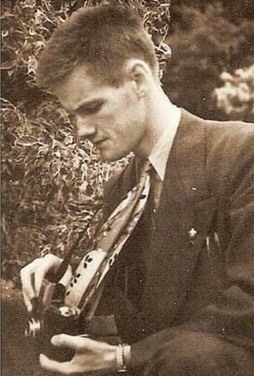 Louis examining his new camera at 19. Photography was one of his many passions. (Submitted by Johanne Lise Landry)