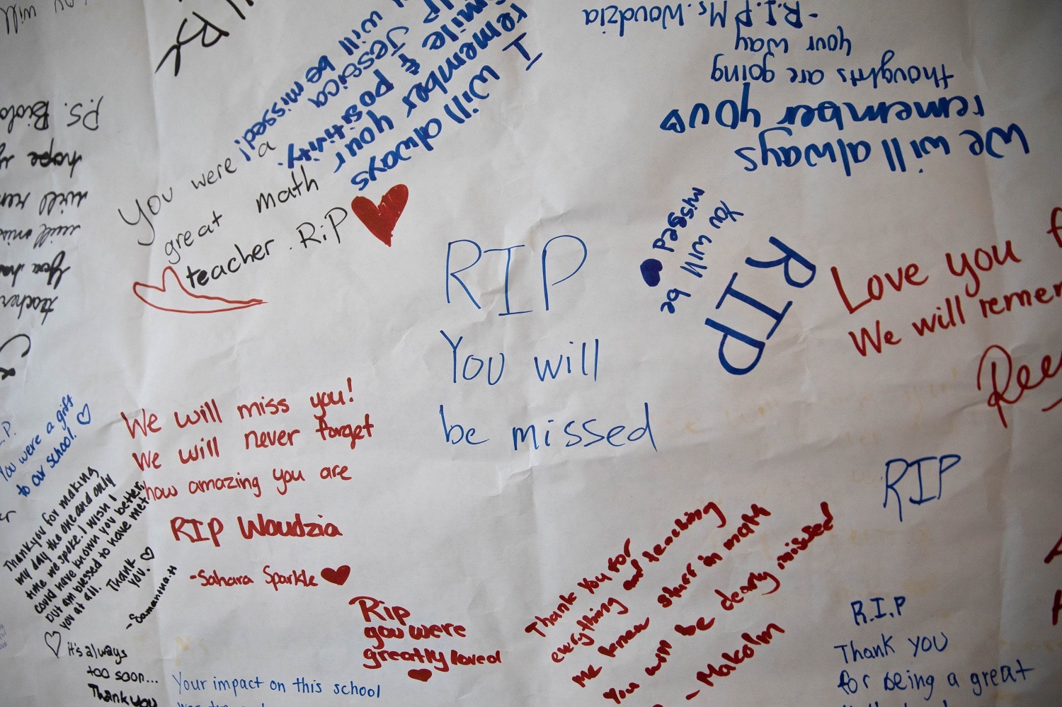 Jessica Woudzia's students at Sands Secondary School in Delta, B.C., wrote messages to remember her after her death. (Maggie MacPherson/CBC)