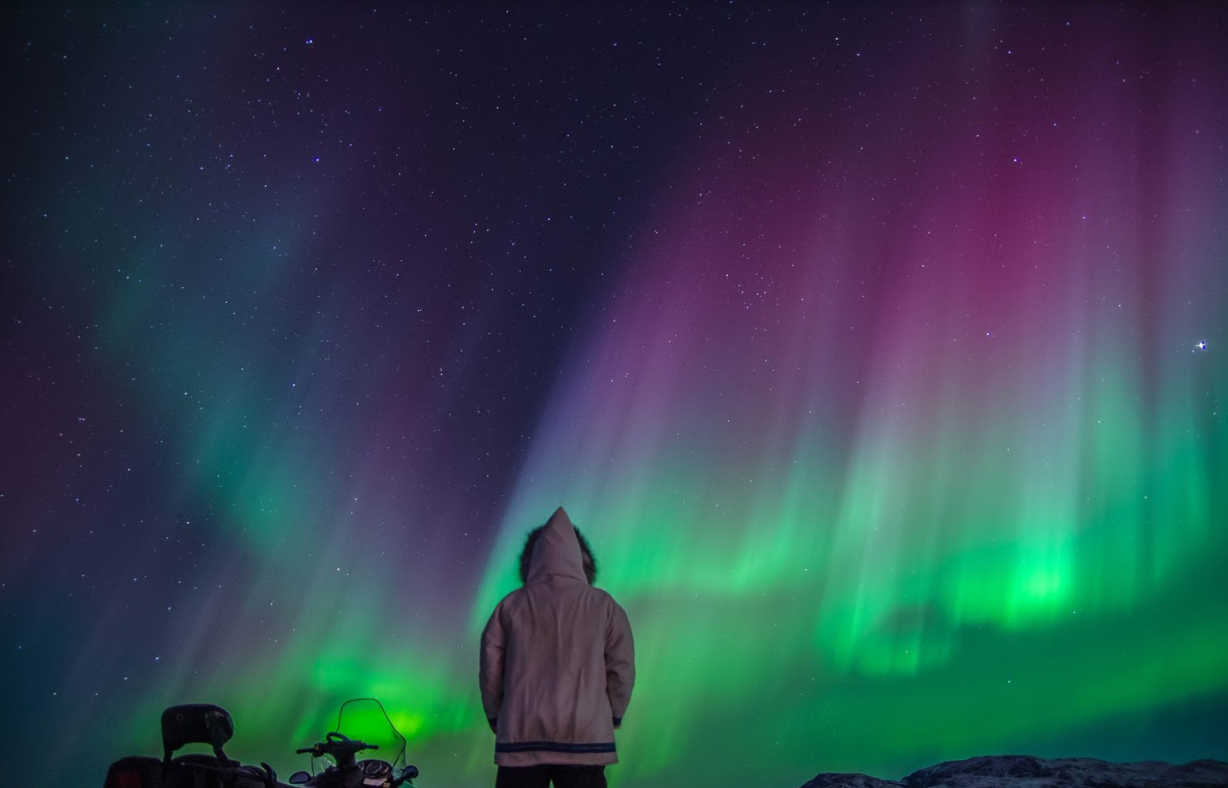 Aurora borealis and Full Moon over the Yukon River, Canada