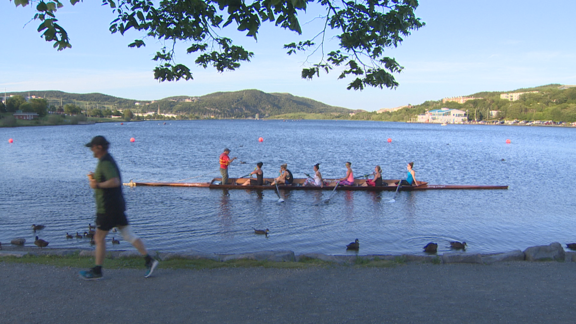 People using the lake for running and rowing in July 2018. (CBC)