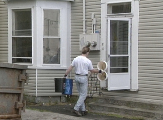 In November 1995, members of the RNC and a contractor ripped up the concrete flooring in 9 Livingstone St. in hopes of finding Sharon Drover's remains. (CBC)