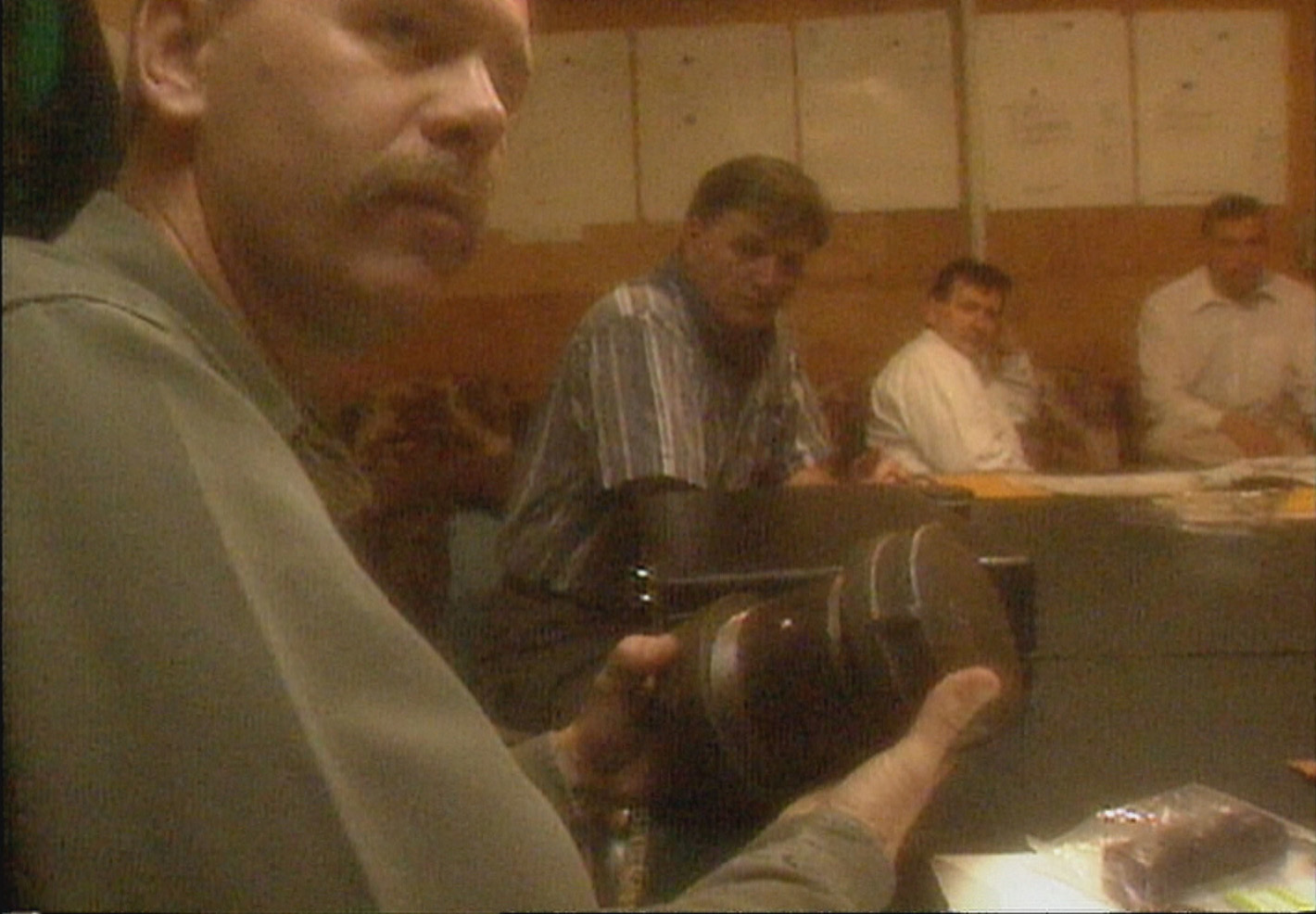 This photo is a dramatization depicting the joint task force meeting, from a 1997 CBC report about the bombings. (CBC)