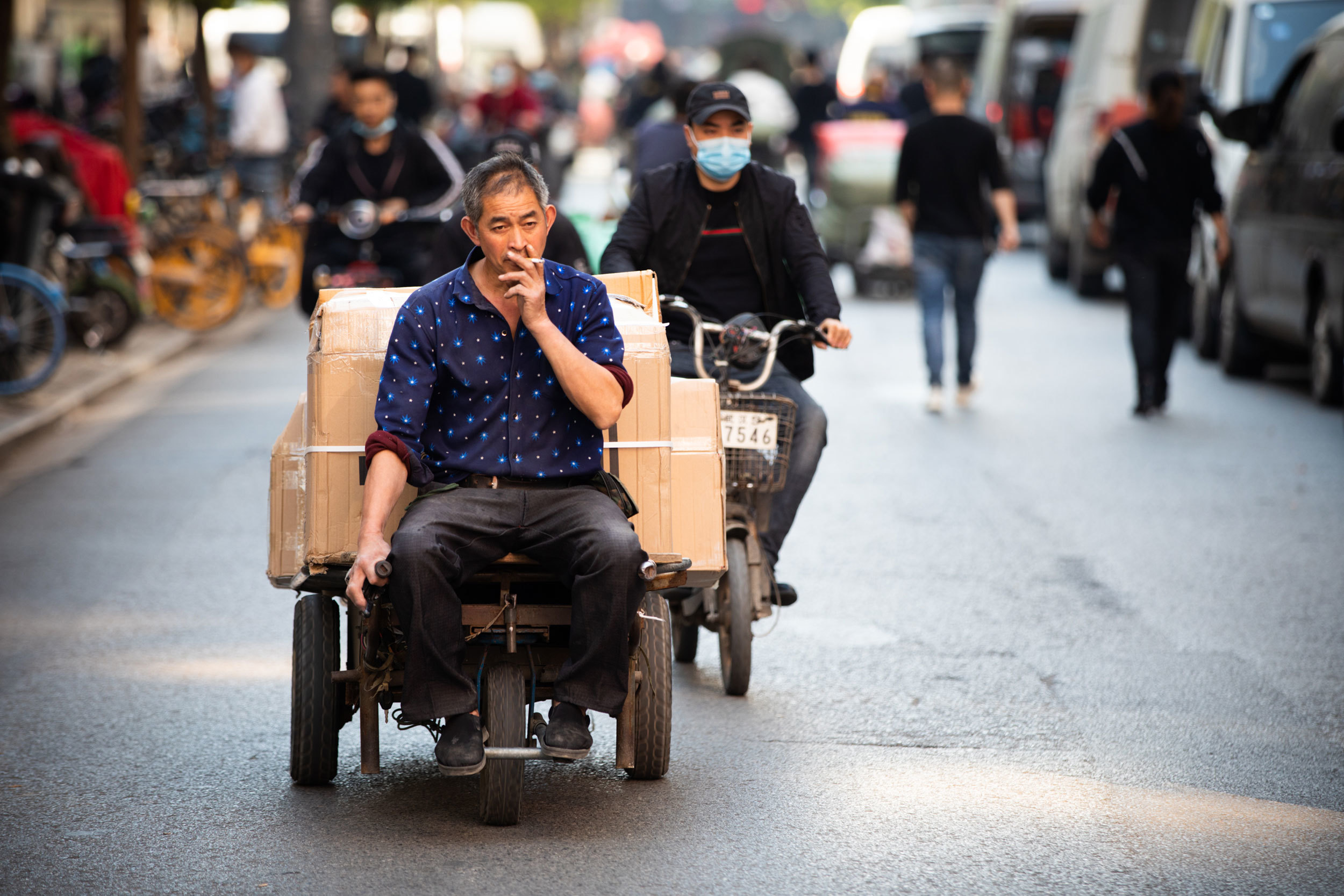 It’s become easier to make a living in Wuhan, as industries such as garment-making have returned and the neighbourhoods that live off them are working again. (Saša Petricic/CBC)