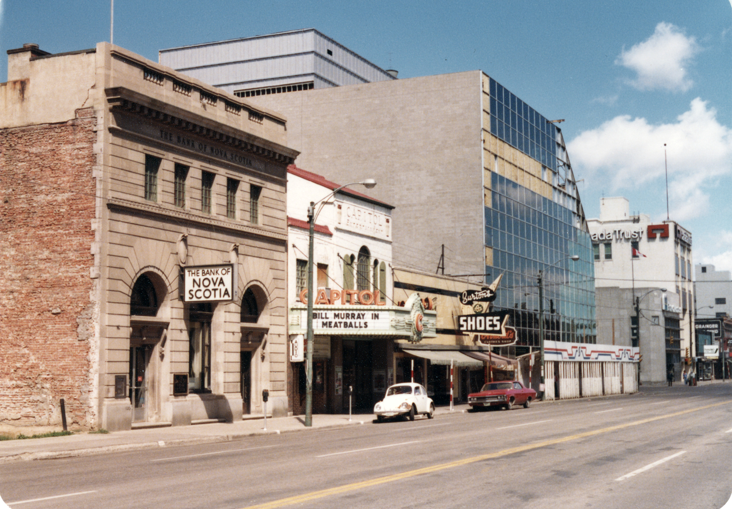 The front facade of the Bank of Nova Scotia, seen here shortly before the demolition, survives today. You can find it inside the Scotia Centre, facing the indoor patio at 2nd Avenue Grill. (Saskatoon Public Library Local History Room; item ph-2001-31-41)