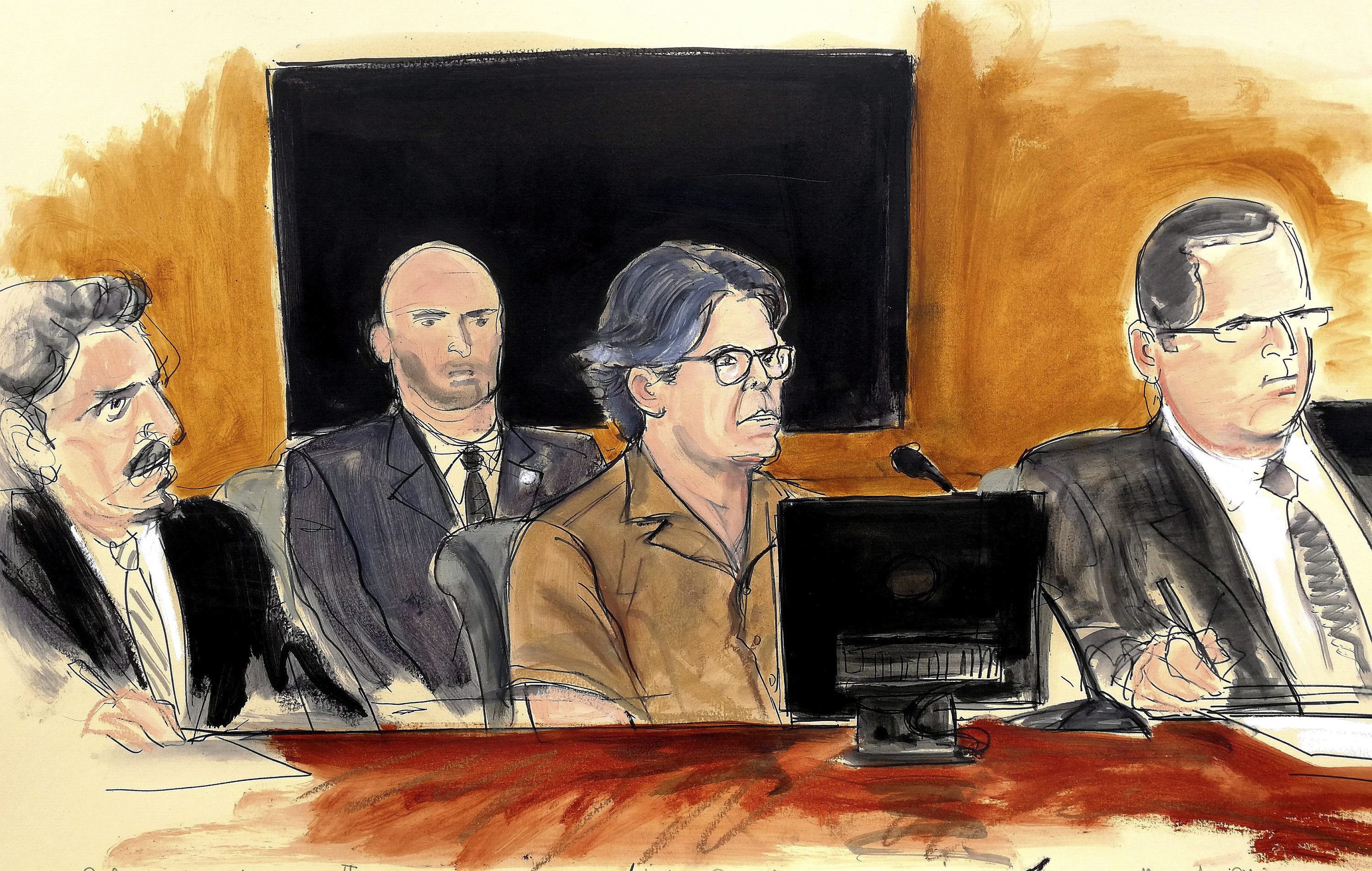 A courtroom sketch depicts Keith Raniere, second from right, leader of the secretive group NXIVM, during his court appearance in New York on April 13, 2018. (Elizabeth Williams/Associated Press)