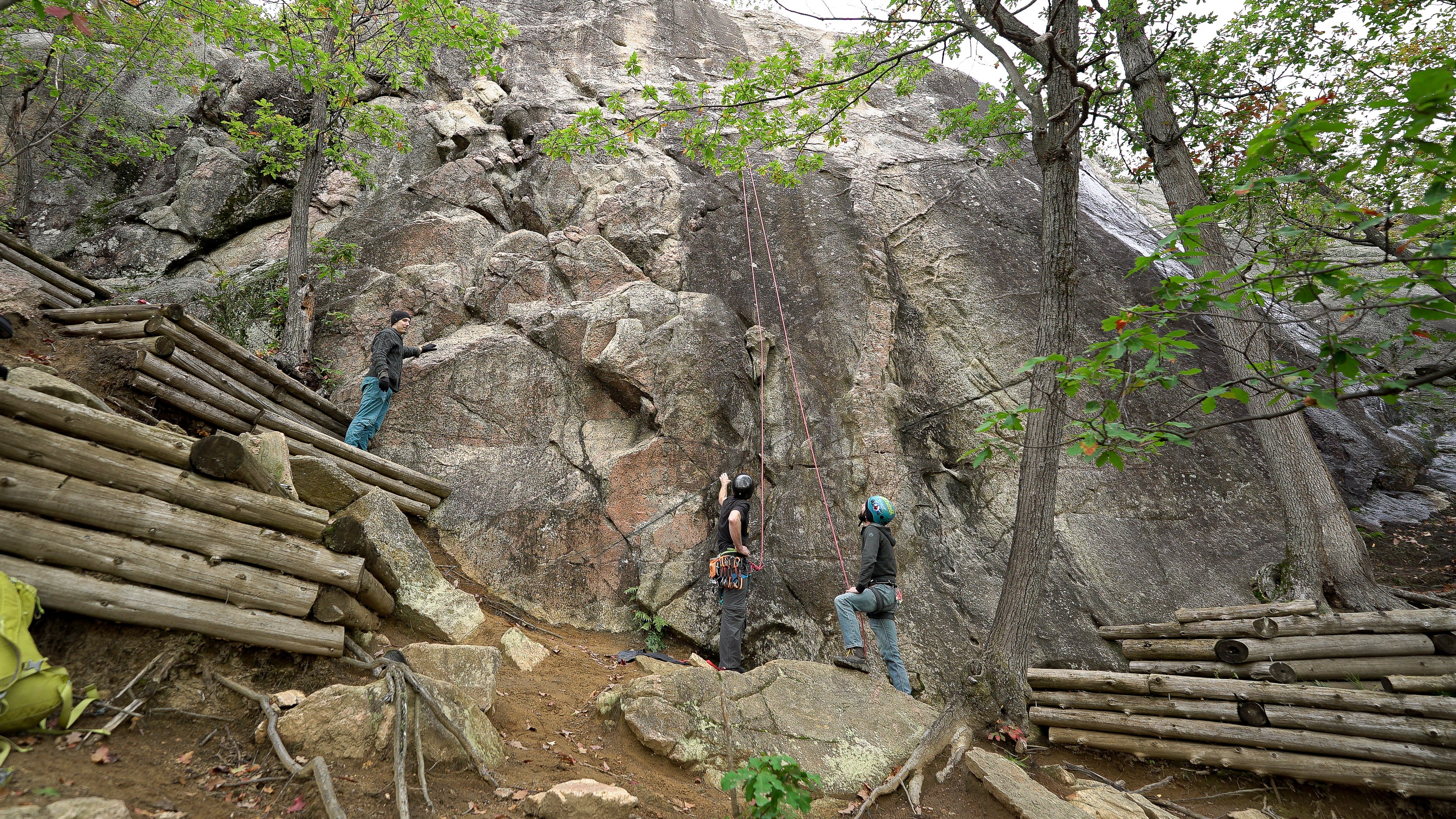 From left to right Carson Sherwood, Sean Decaire and Vince Smith at the Eastern Block climbing area, on the Eardley Escarpment in Luskville Que. (Alexander Behne/CBC)