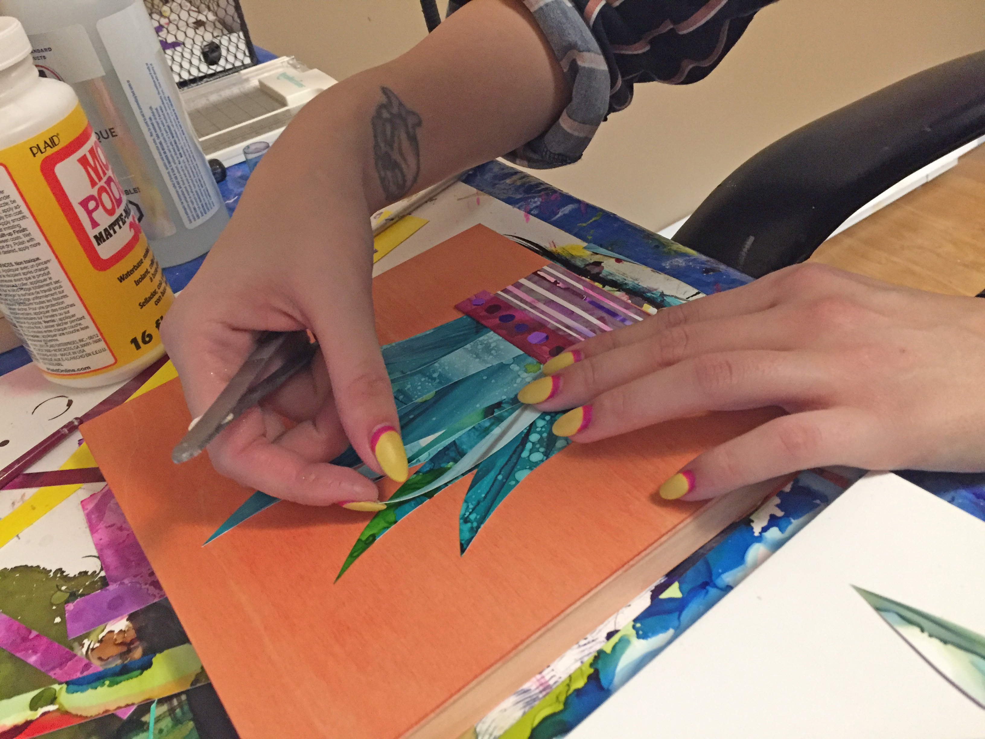 Creating a layered alcohol painting takes patience, as each layer needs time to dry. (Stephanie Tobin/CBC)