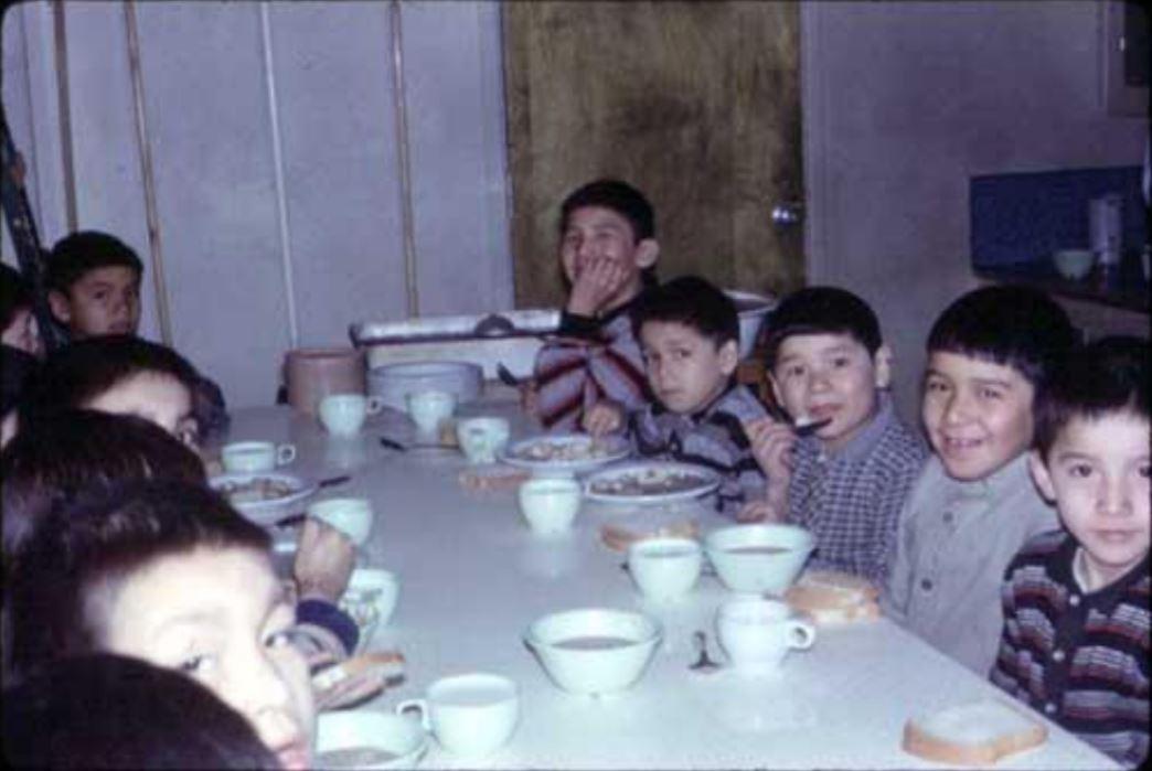 Boys eating a meal in the cafeteria in 1967. (Mildred Young Hubbert/Archives of Ontario)