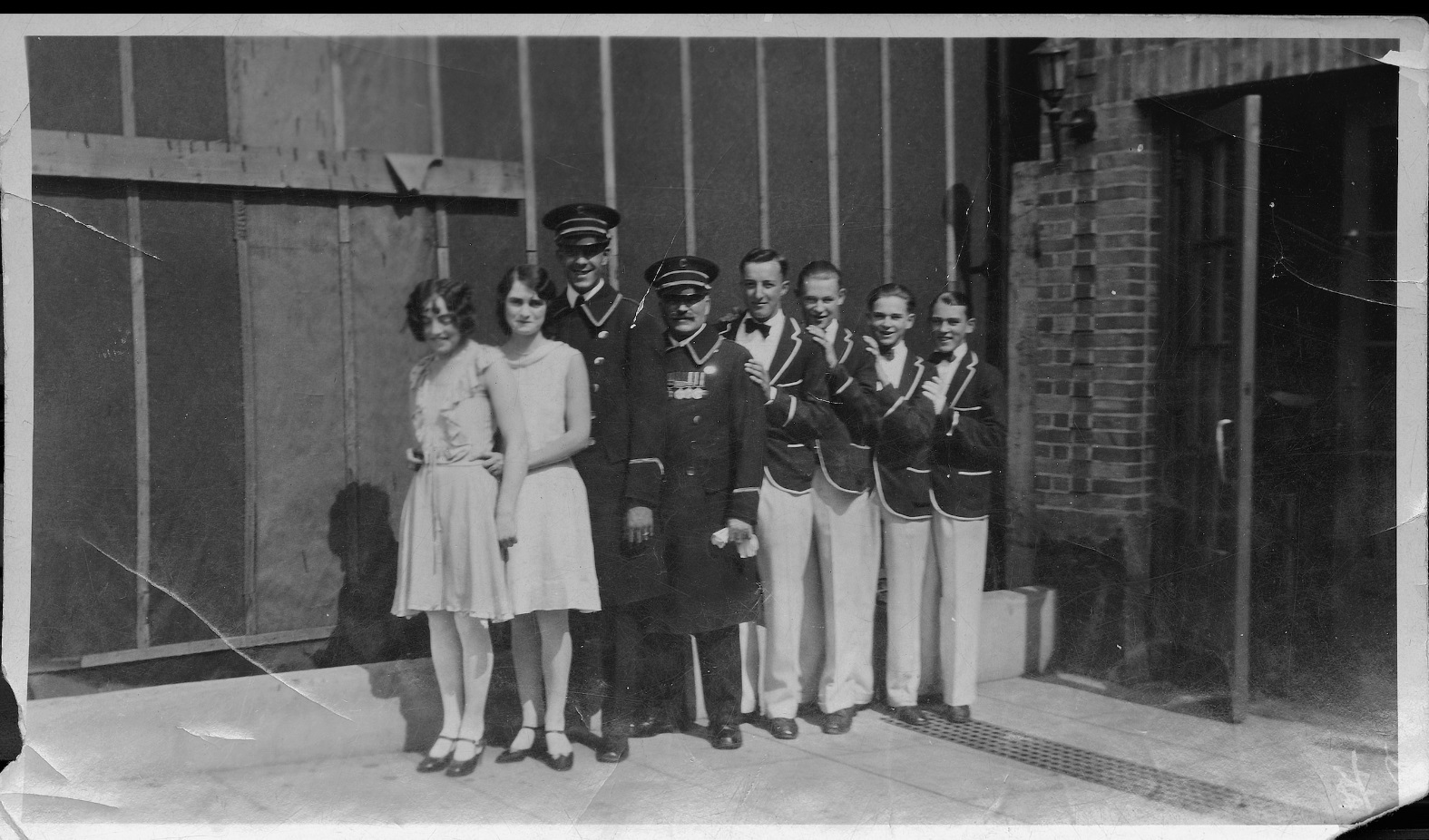 The Capitol staff around 1929. That's manager Reg Plumb next to one of the frilly-dressed usherettes. "All our ushers and our doorman were immaculately dressed. We had what we called a footman on the Second Avenue entrance. When the cars pulled up, he opened the doors for people to get out to come to the theatre. (Saskatoon Public Library Local History Room; item PH-88-982) 