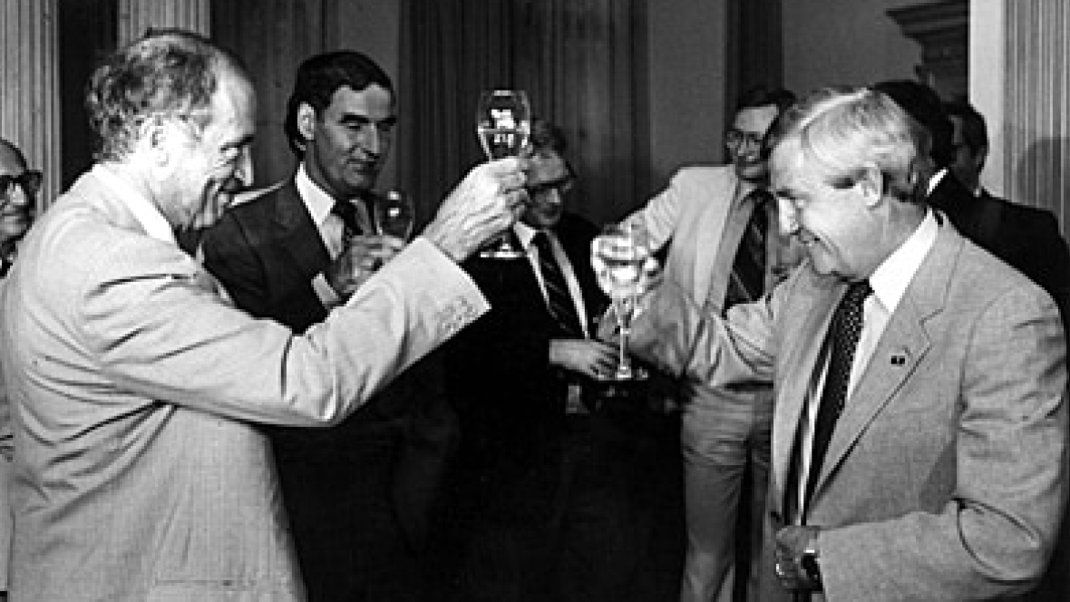 Peter Lougheed said this photo of a champagne toast to celebrate a compromise with Pierre Trudeau was one of his greatest regrets. Photo: Bob Cooper/The Canadian Press