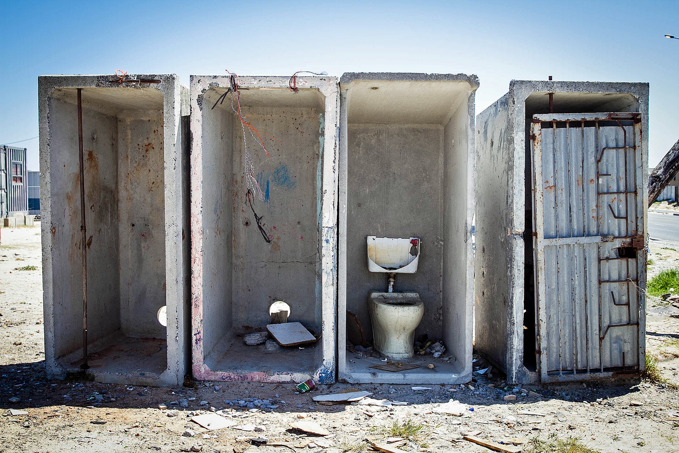 A bank of communal toilets in an informal settlement in the township of Khayelitsha, in southeastern Cape Town. (Lily Martin/CBC)