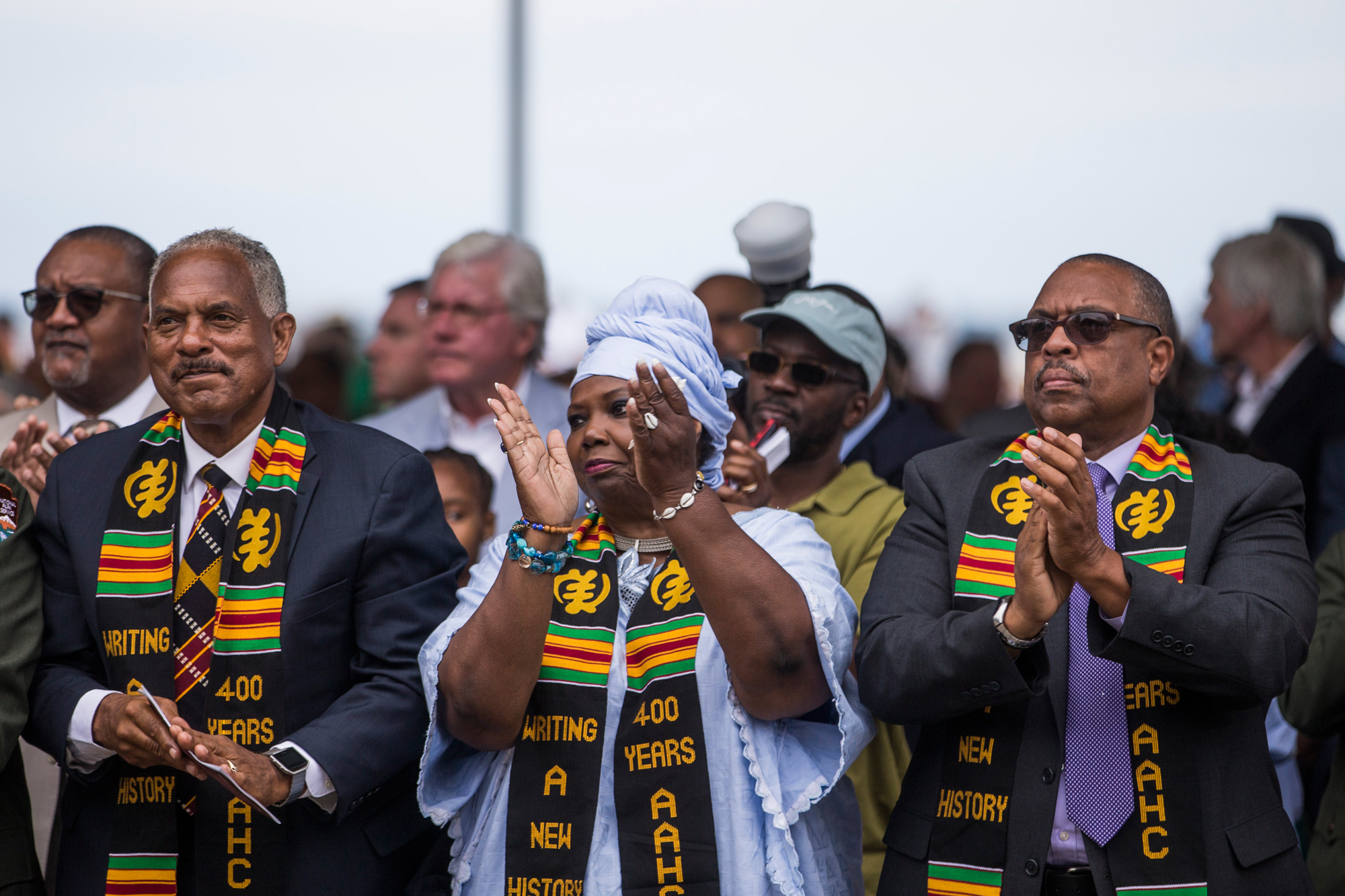 Members of the audience applaud during a ceremony in Hampton, Va., on Aug. 24, 2019, commemorating the 400th anniversary of the arrival of the first African slaves to English North America in 1619. (Zach Gibson/Getty Images)