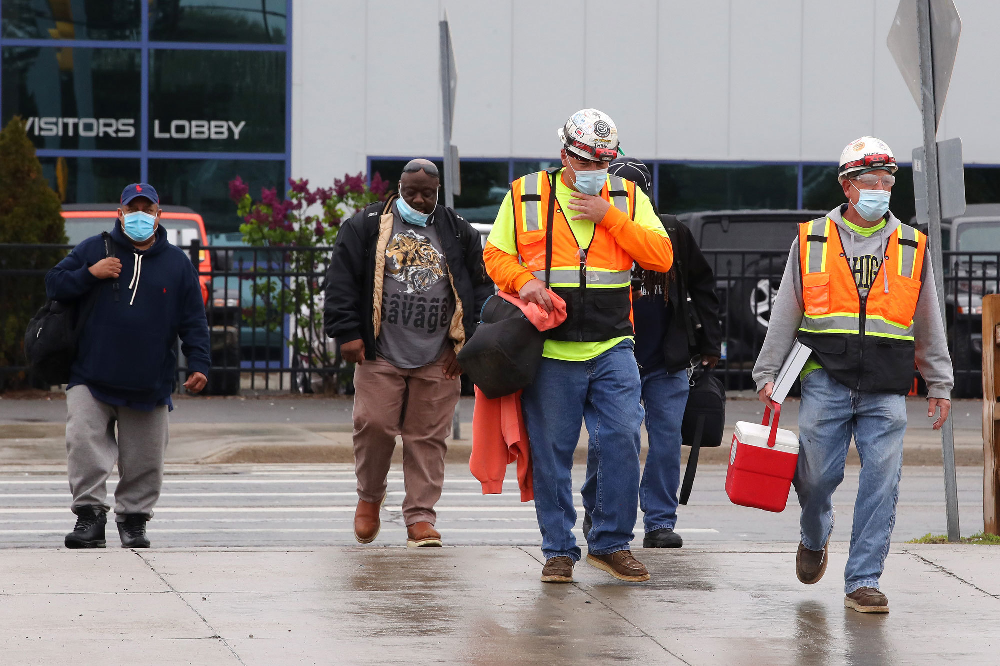 Workers at the Fiat Chrysler truck plant in Warren, Mich., finish their shift. (Gregory Shamus/Getty Images)