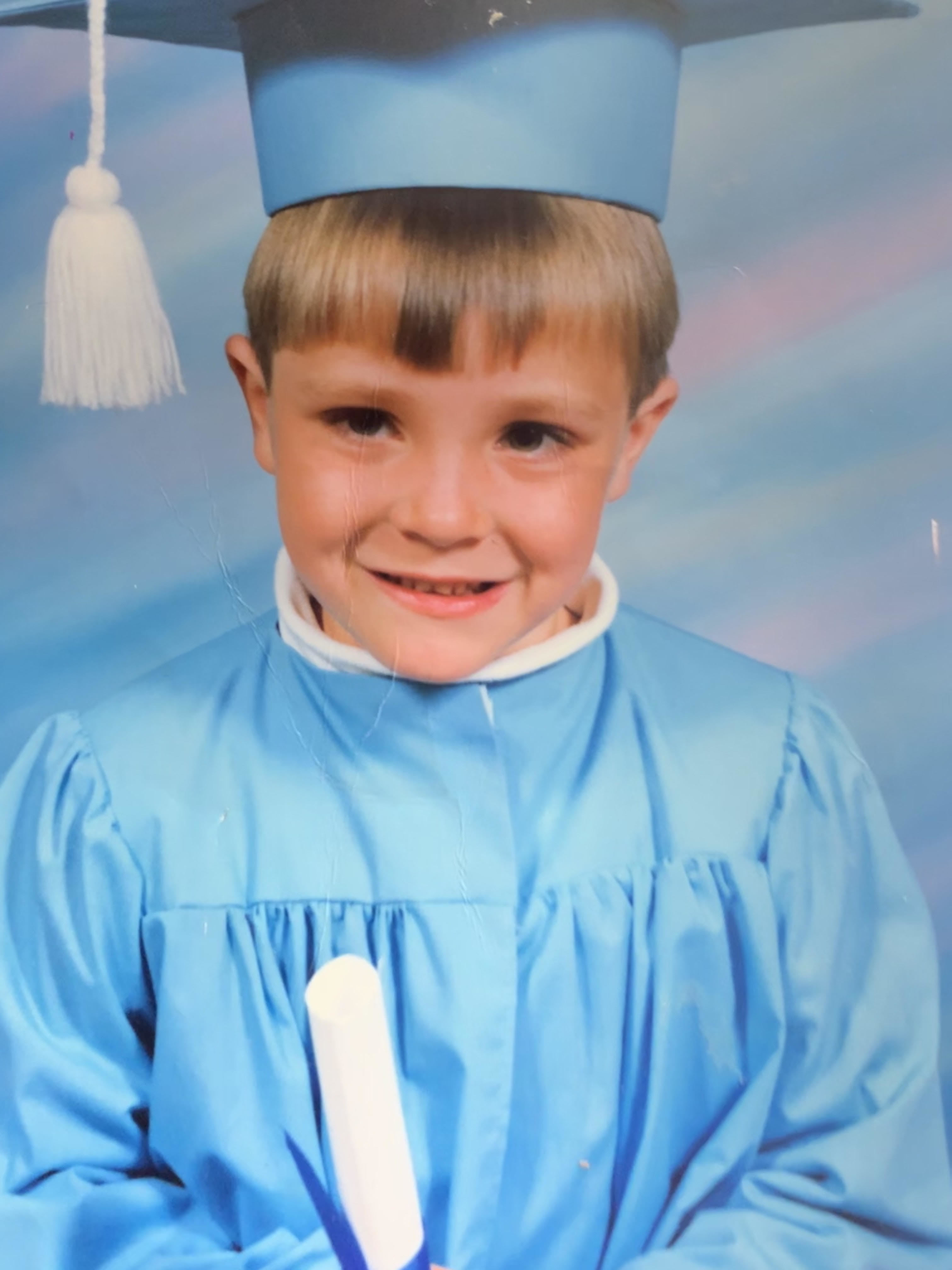 Philip Pynn grasps his kindergarten diploma in a school photo that is proudly displayed on Loretta Pynn’s fridge (Submitted)